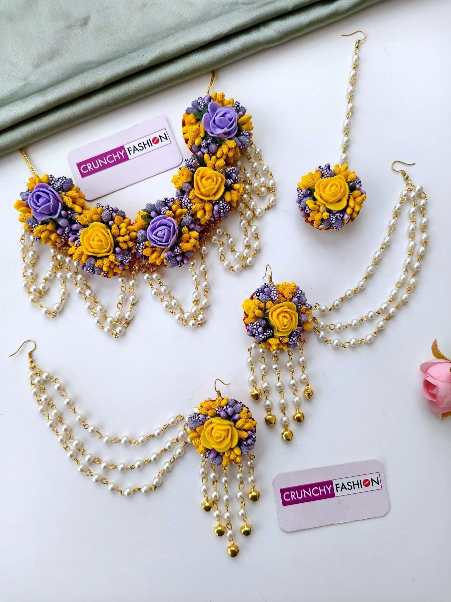 Handcrafted yellow and purple floral bridal jewellery set for women, ideal for haldi, mehndi, and spring weddings 2026