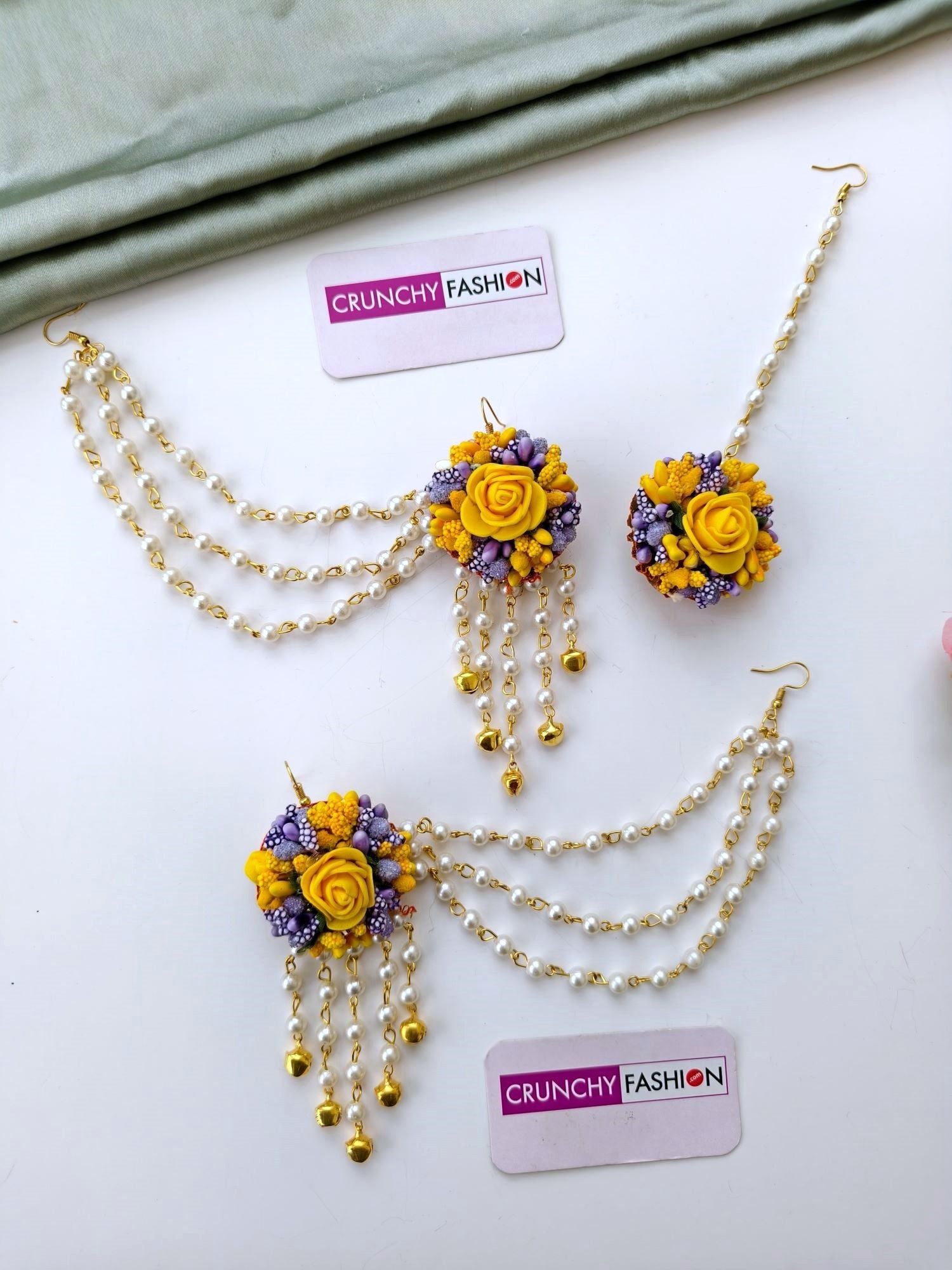 Handcrafted yellow and purple floral bridal jewellery set for women, ideal for haldi, mehndi, and spring weddings 2026