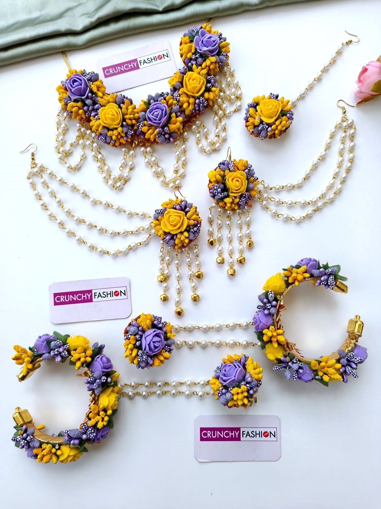 Handcrafted yellow and purple floral bridal jewellery set for women, ideal for haldi, mehndi, and spring weddings 2026