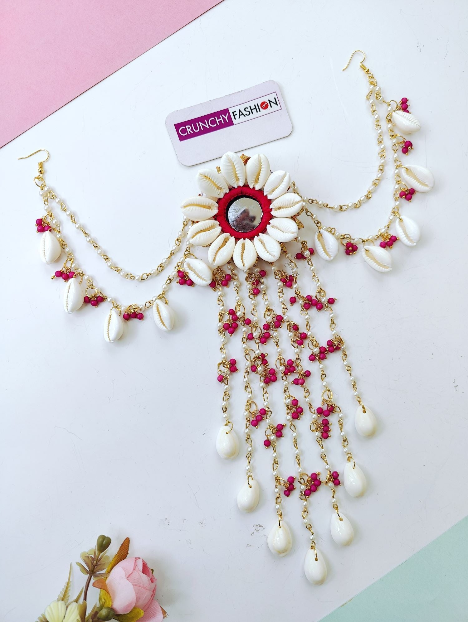 Handmade shell and pink pearl hair accessory with mirror detail, perfect for bridal hair or haldi ceremonies