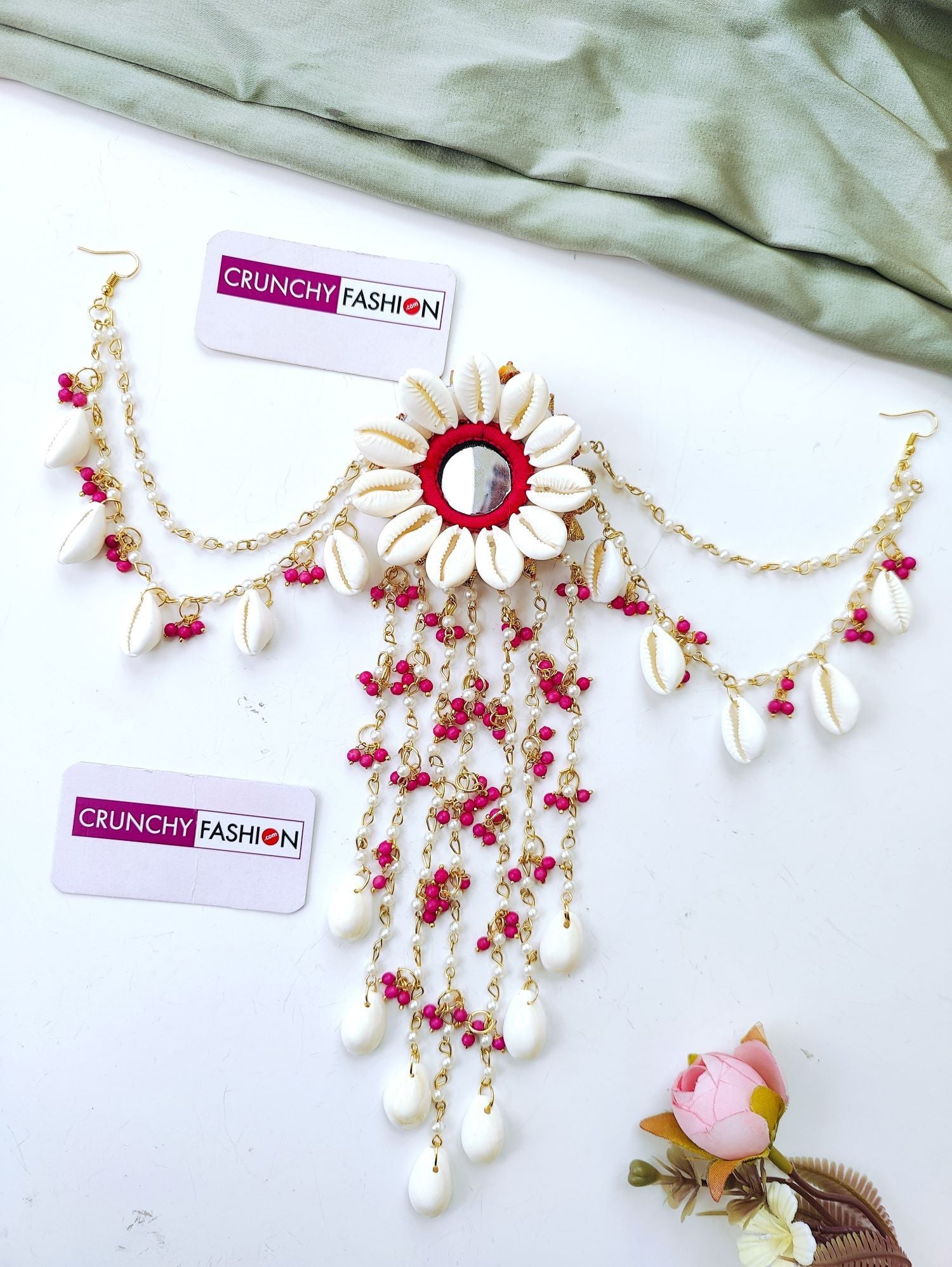 Handmade shell and pink pearl hair accessory with mirror detail, perfect for bridal hair or haldi ceremonies