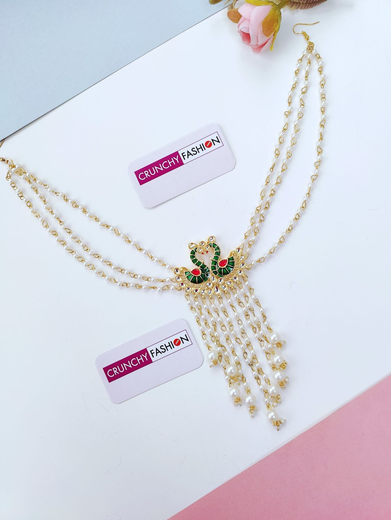 peacock design hair accessory in green pink kundan for wedding