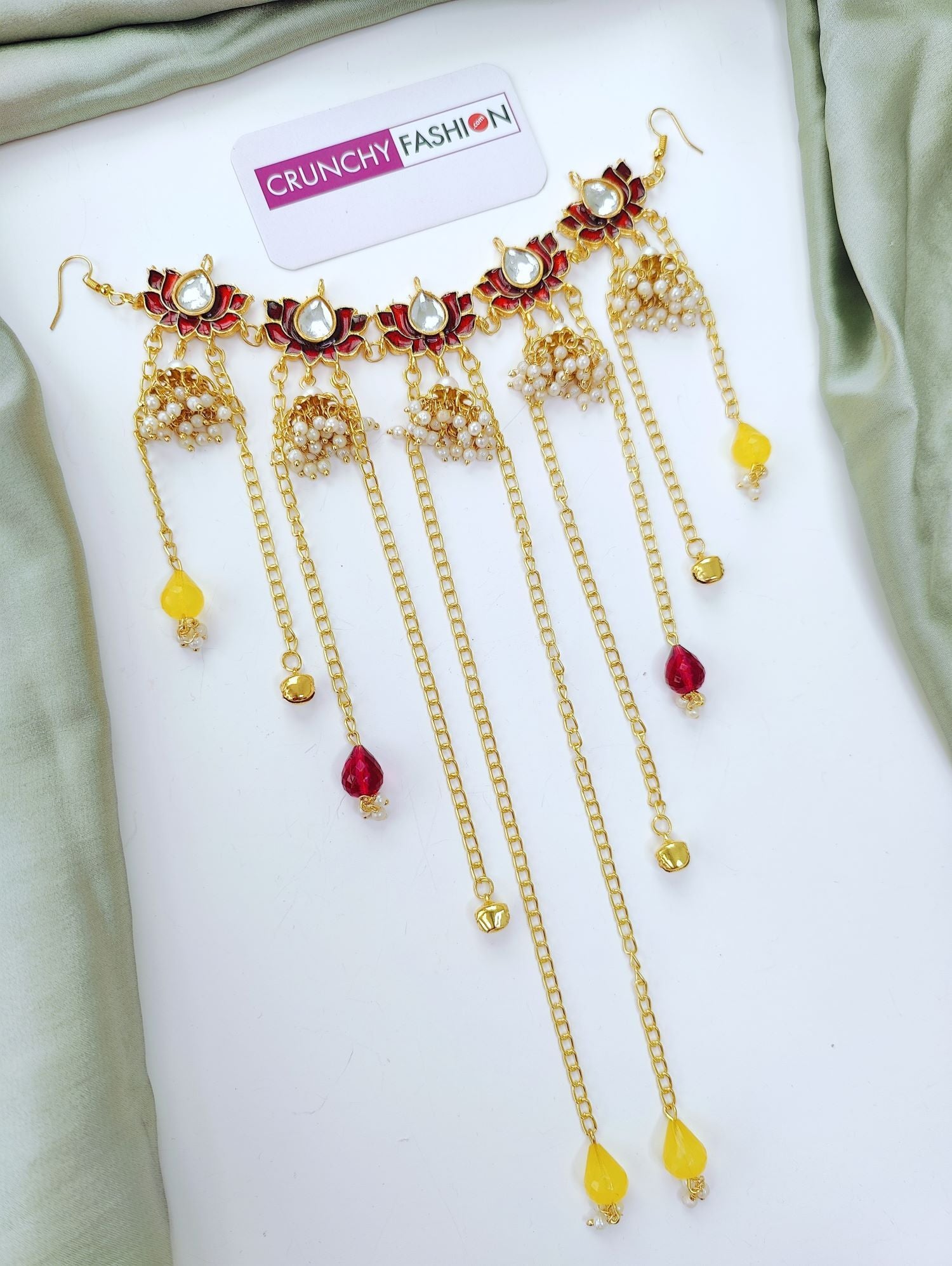 Maroon kundan lotus hair accessory for haldi and mehndi brides