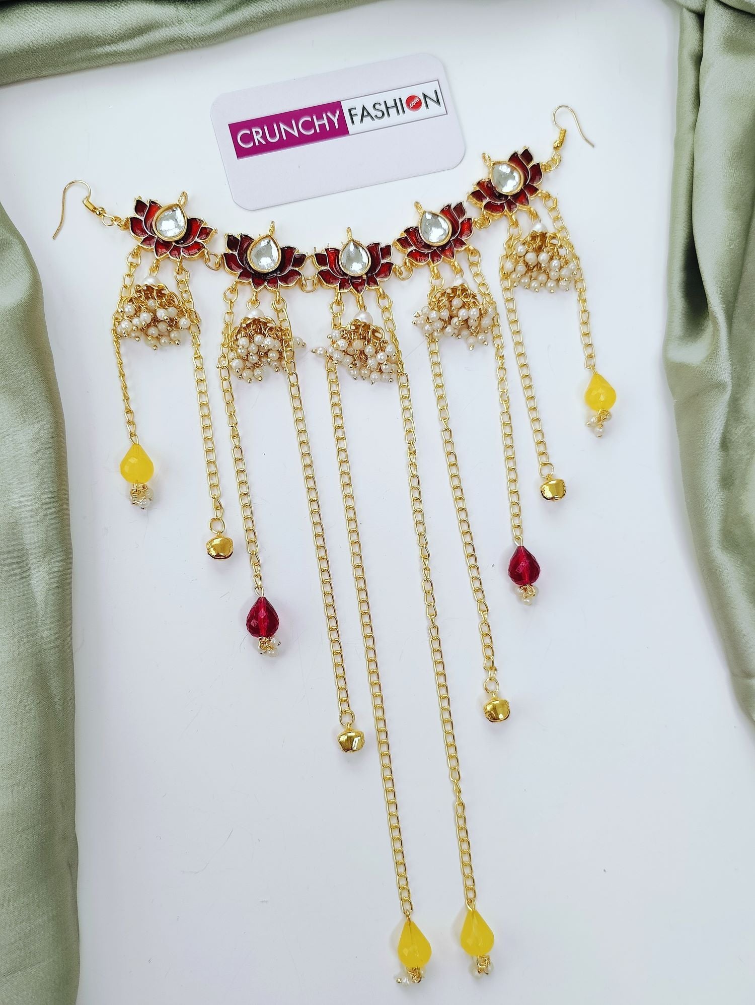Maroon kundan lotus hair accessory for haldi and mehndi brides