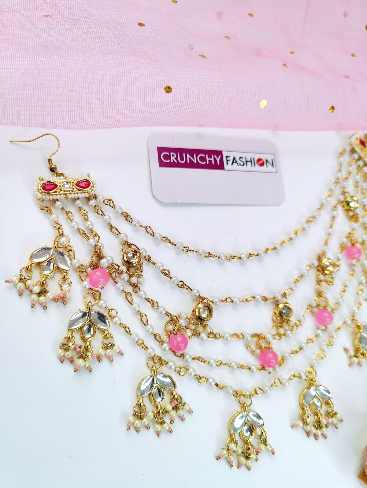 light pink floral hair accessory with kundan and pearl for brides