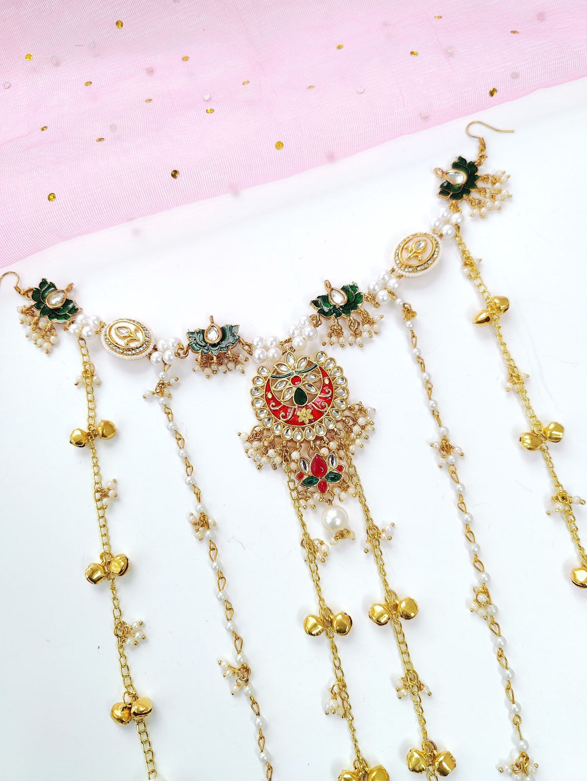 floral kundan hair accessory in green and red for bridal haldi mehndi