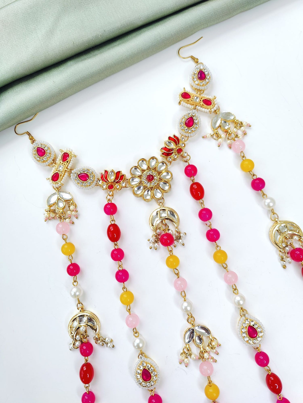 pink floral hair accessory with kundan and pearl for wedding bride