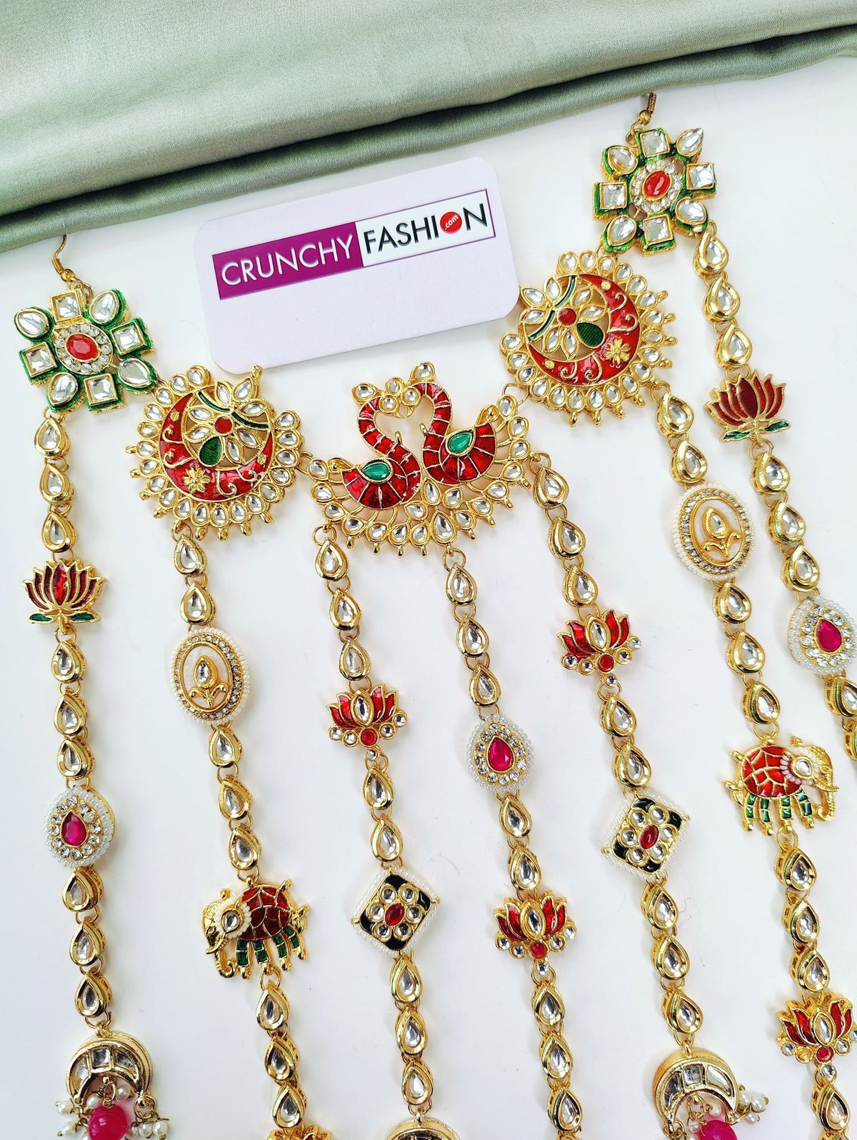 maroon floral hair accessory with kundan and pearl for wedding