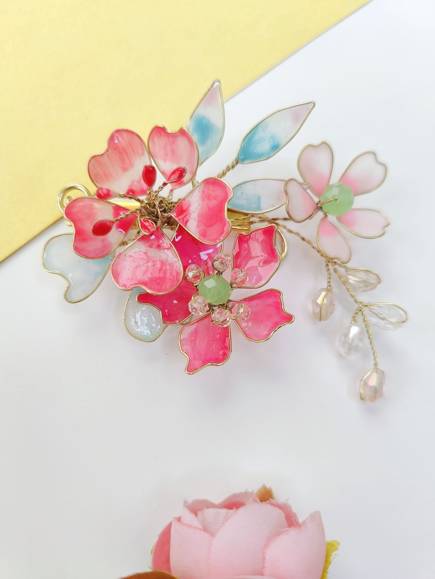 Handmade resin jewellery hair accessory in sky blue and pink, floral design for wedding, haldi or mehandi bun