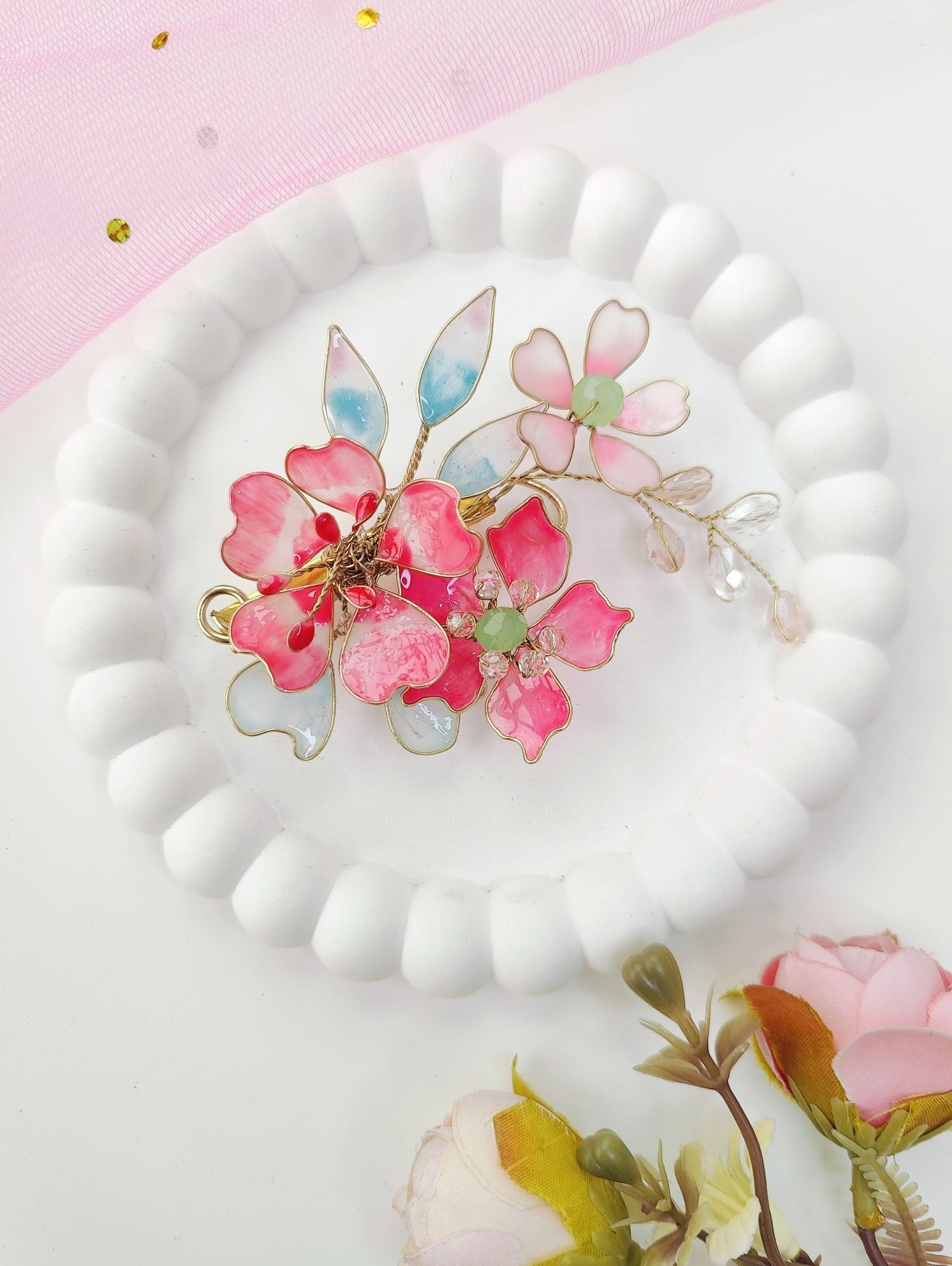 Handmade resin jewellery hair accessory in sky blue and pink, floral design for wedding, haldi or mehandi bun