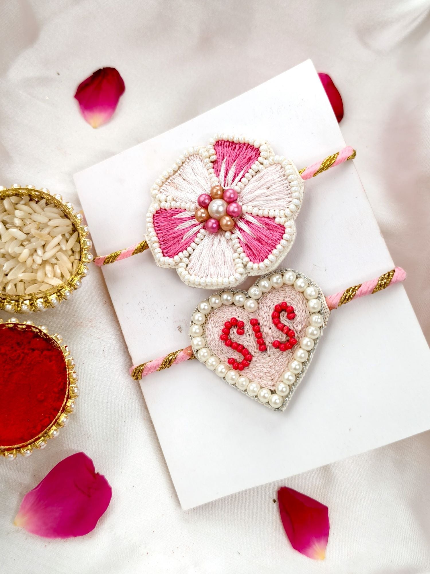 Rakhi hamper set of 2 – cute sis pink flower rakhi with chocolate