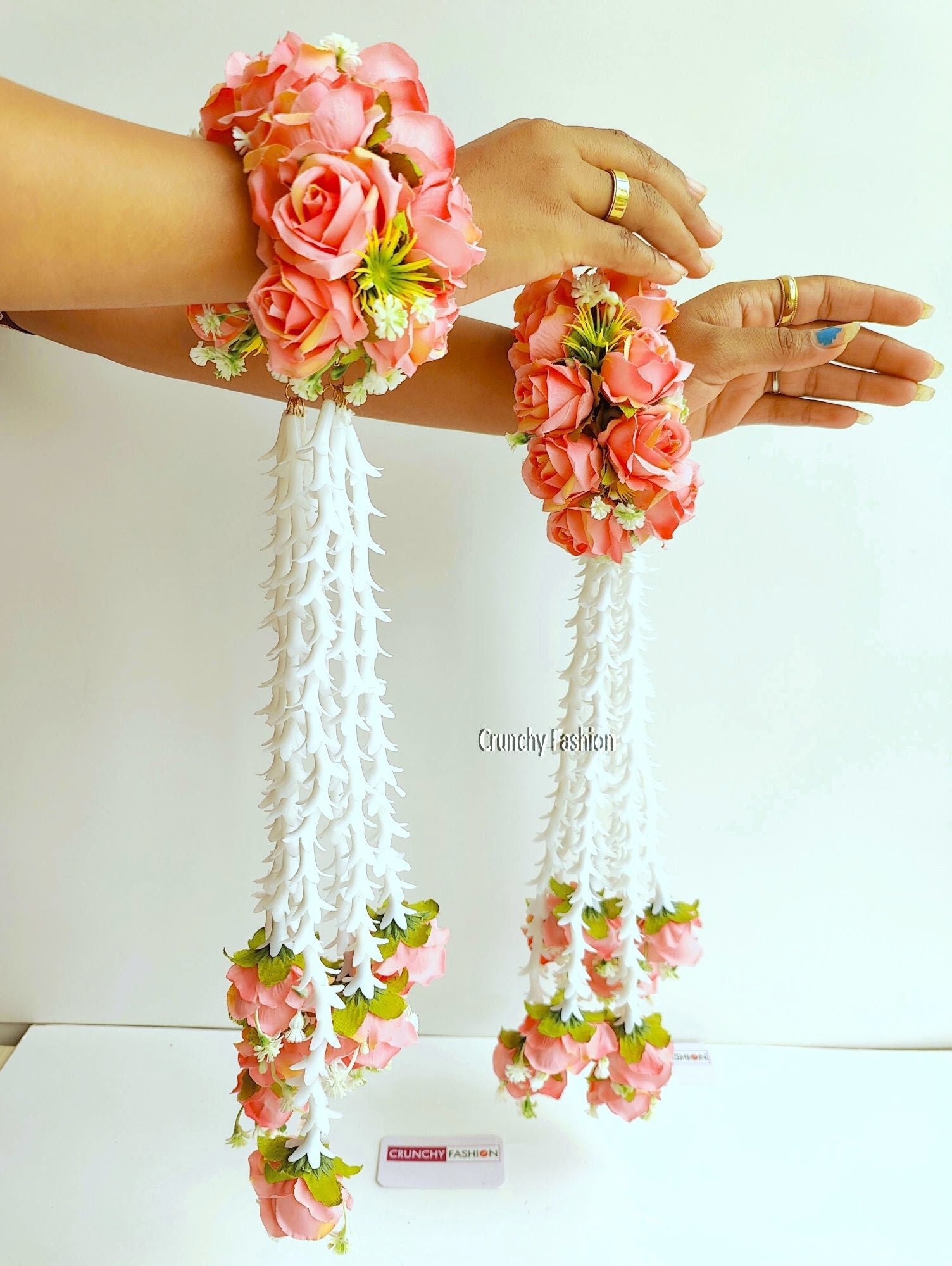 Designer Bridal Kalire in Peach color, adorned with Pastel Pink Roses and Pearls, perfect for Haldi and Wedding occasions