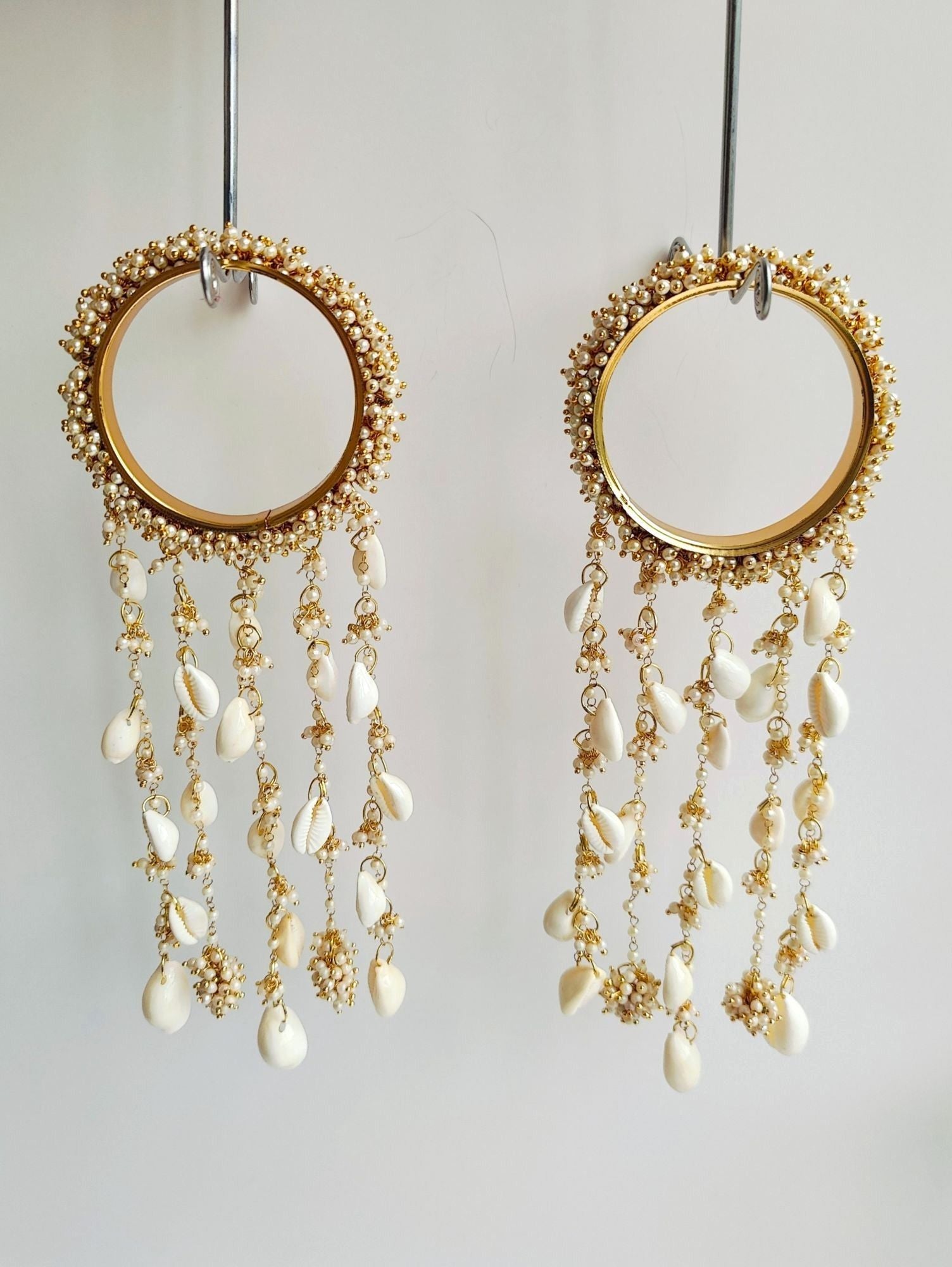 White Bridal Kalire in Floral design with Pearls & Shells, ideal for summer weddings and haldi ceremonies