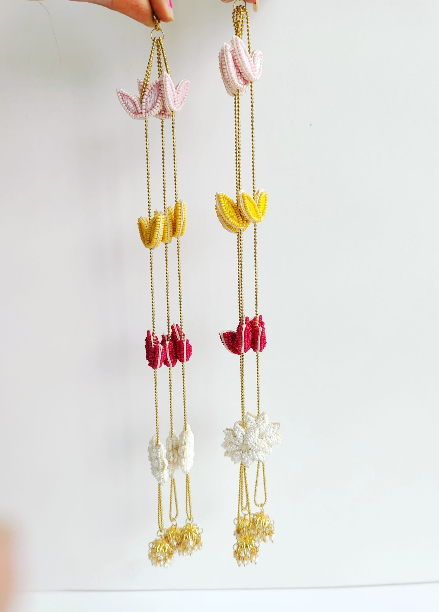 Handmade Floral Kaleere in Pink, Yellow-White. This pearl Kalira, perfect for weddings, haldi, mehendi or carnival.