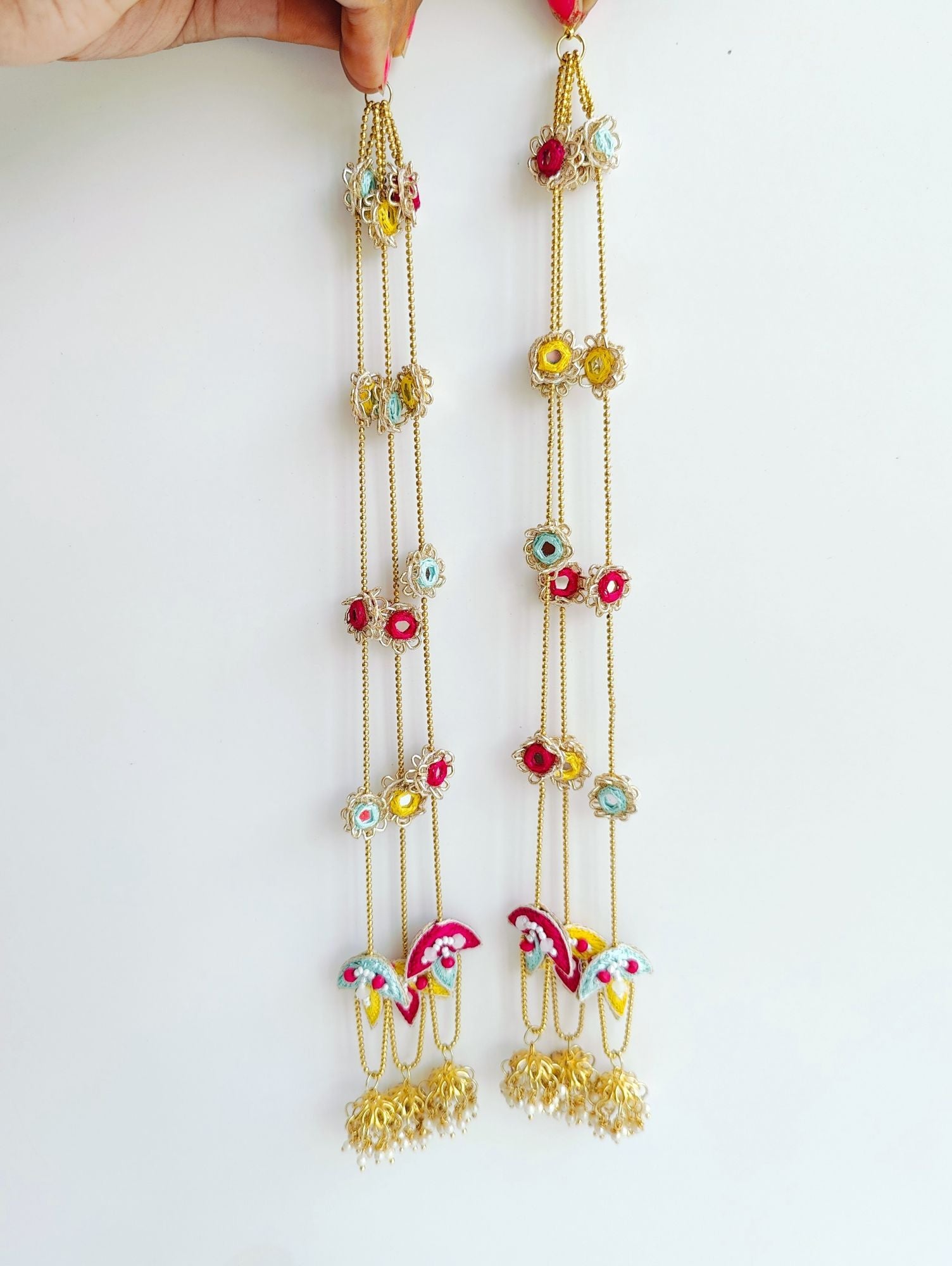 Handmade bridal Kaleere with pink, yellow, white flowers, perfect for Haldi, Mehandi, weddings. Ideal for women, girls.