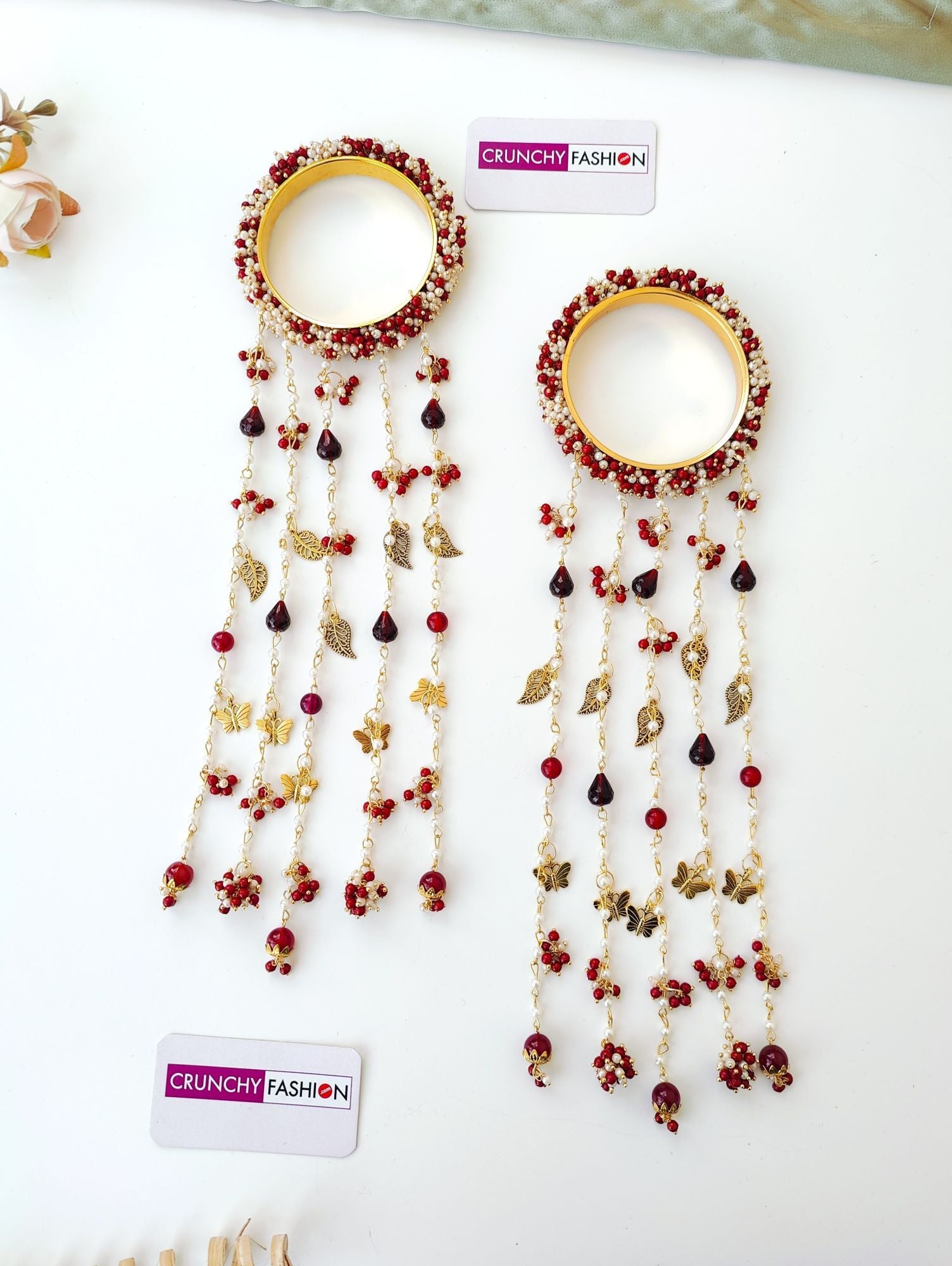 Handmade maroon-gold bridal kaleere with white pearls and sea shells, floral design for haldi, mehandi or wedding