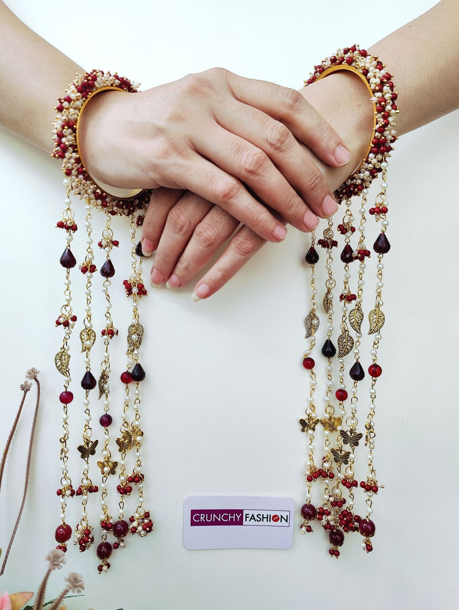 Handmade maroon-gold bridal kaleere with white pearls and sea shells, floral design for haldi, mehandi or wedding