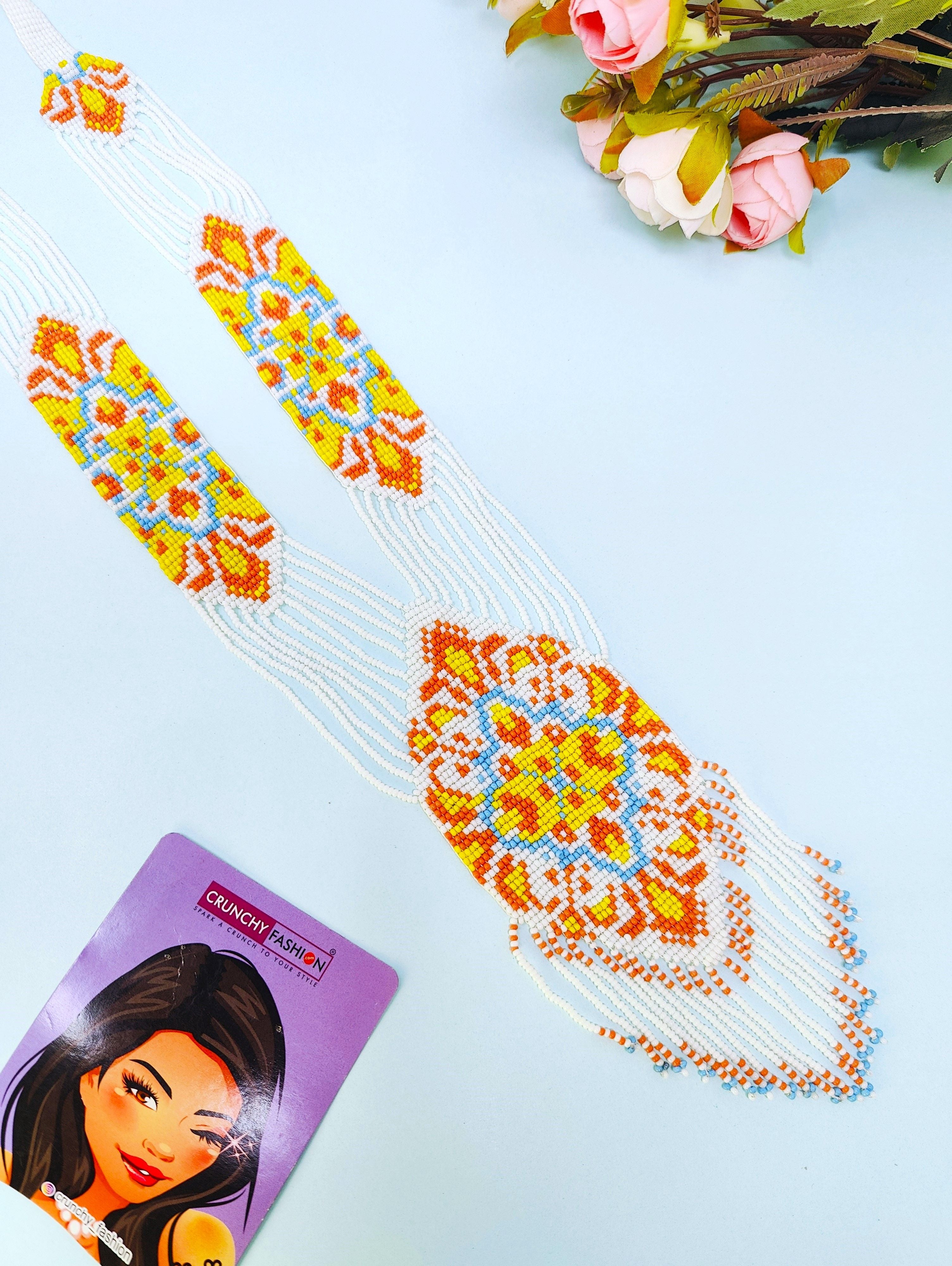 Handcrafted multicolor beaded necklace, ideal for women and girls for parties, weddings, and festivals. Long, ethnic themed, part of the HANDICRAFT collection.