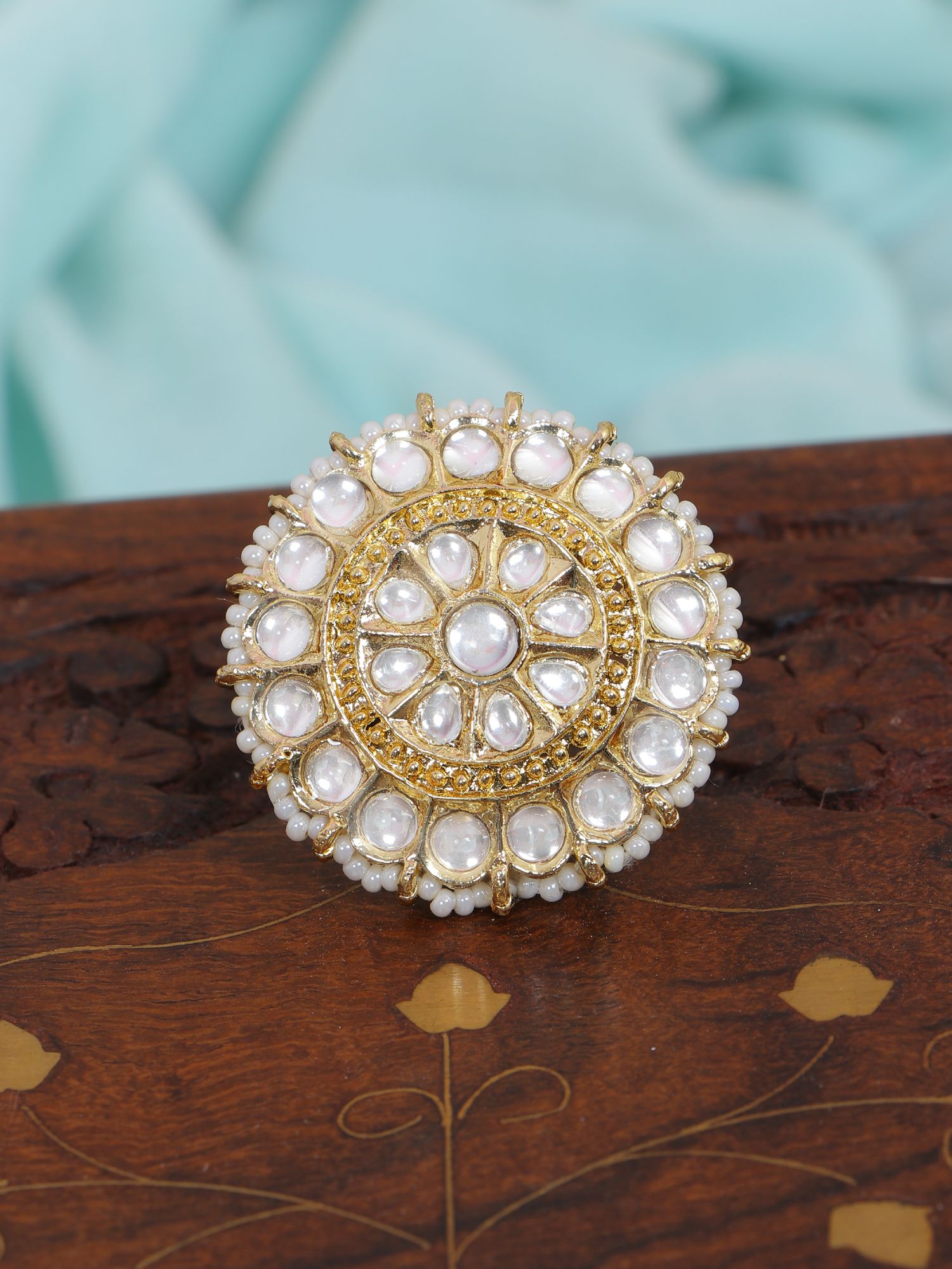 Women's antique gold plated round ring, adorned with kundan, perfect for party wear, adjustable size, from the traditional collection
