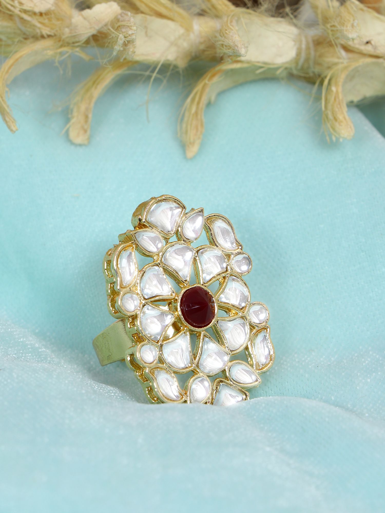 White Kundani ring, gold-plated and adjustable, perfect for party wear. Antique design with marquise shape polished finish. Ideal gold statement ring for women.