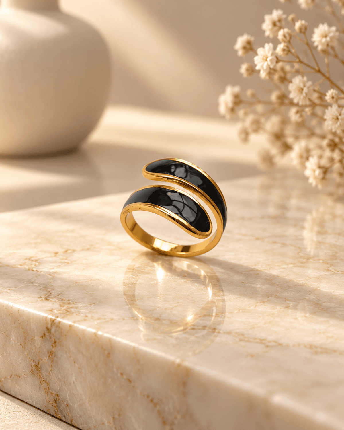 Gold stainless steel anti tarnish wrap ring with black enamel