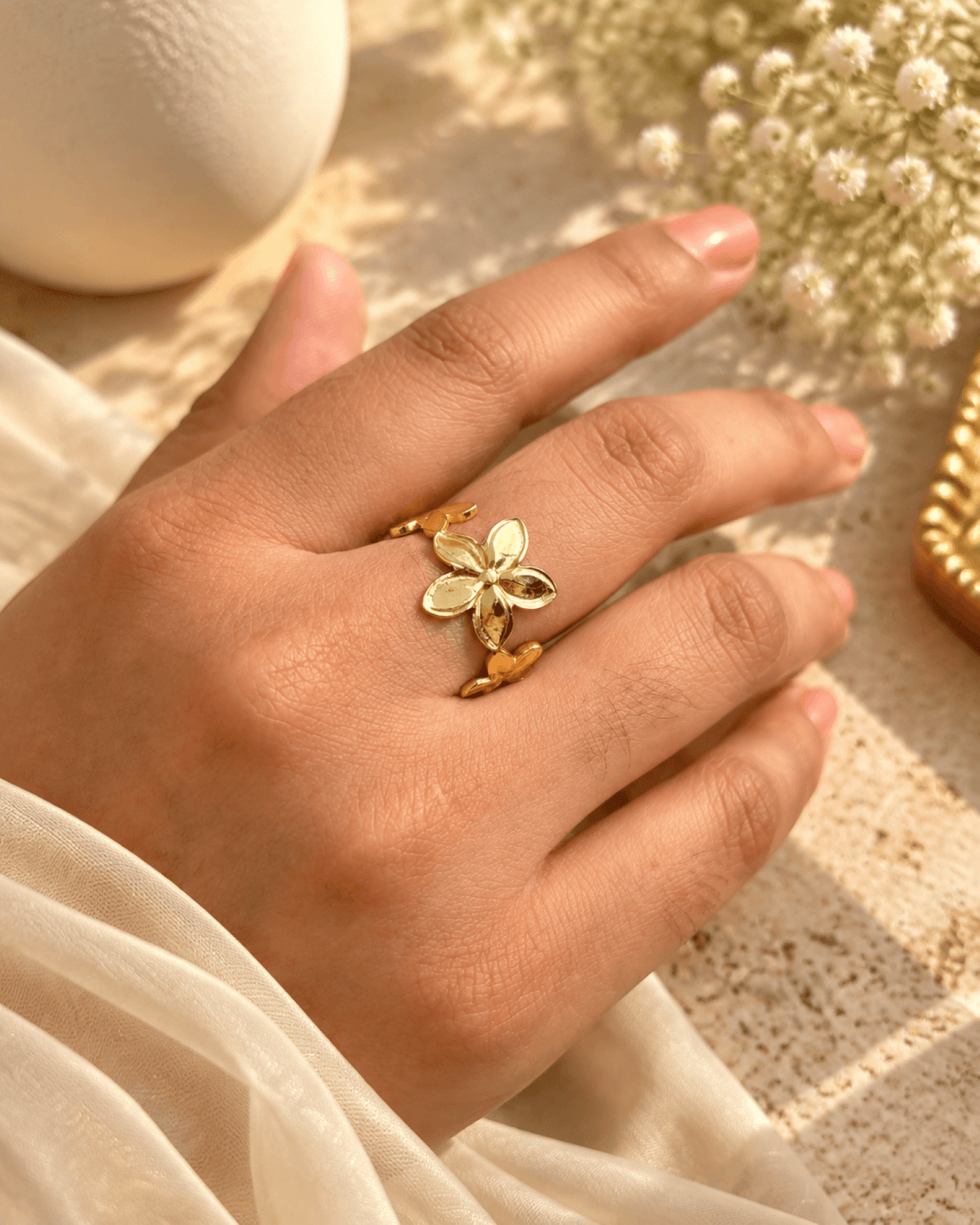 Floral stainless steel anti tarnish ring for women, adjustable gold