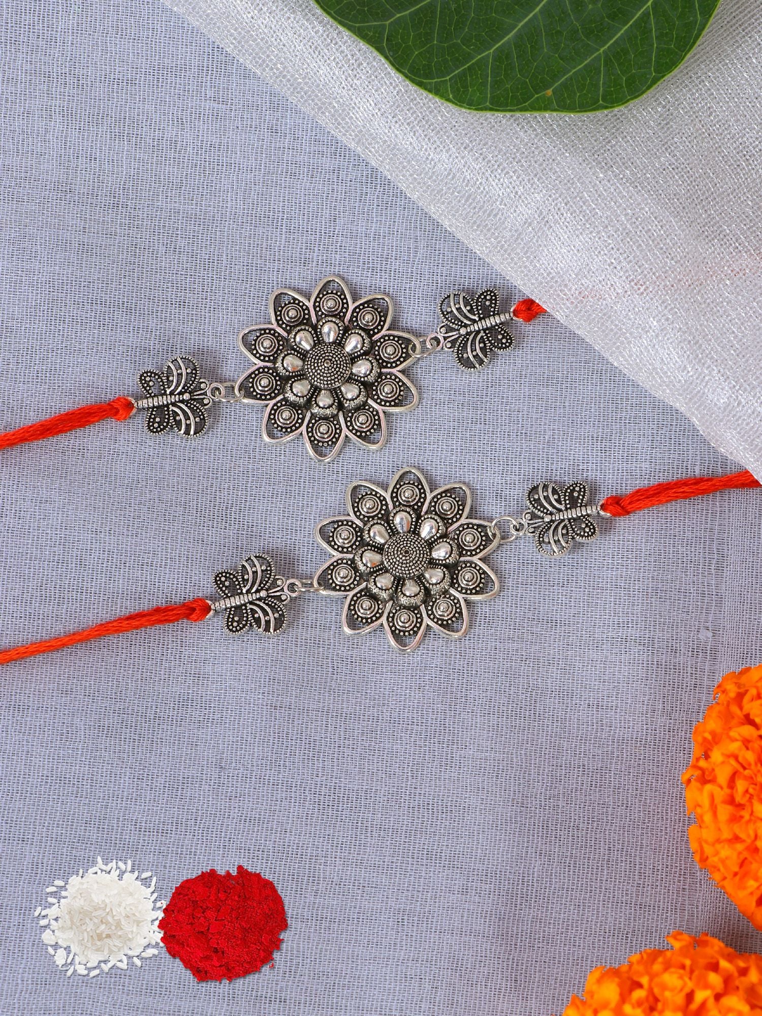 Silver oxidised flower rakhi set of 2 for brother and bhabhi, handcrafted gift for Raksha Bandhan 2026