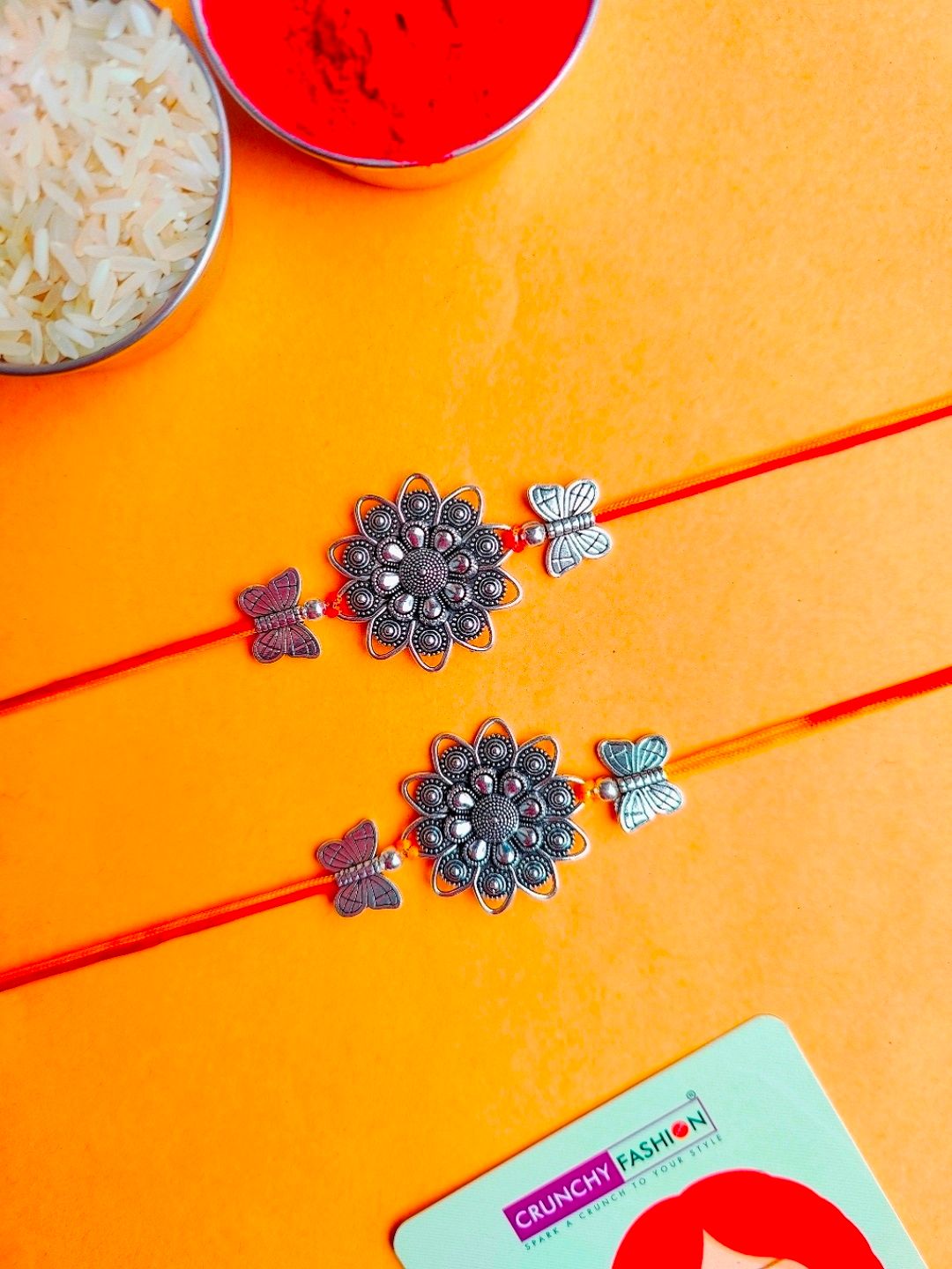 Silver oxidised flower rakhi set of 2 for brother and bhabhi, handcrafted gift for Raksha Bandhan 2026