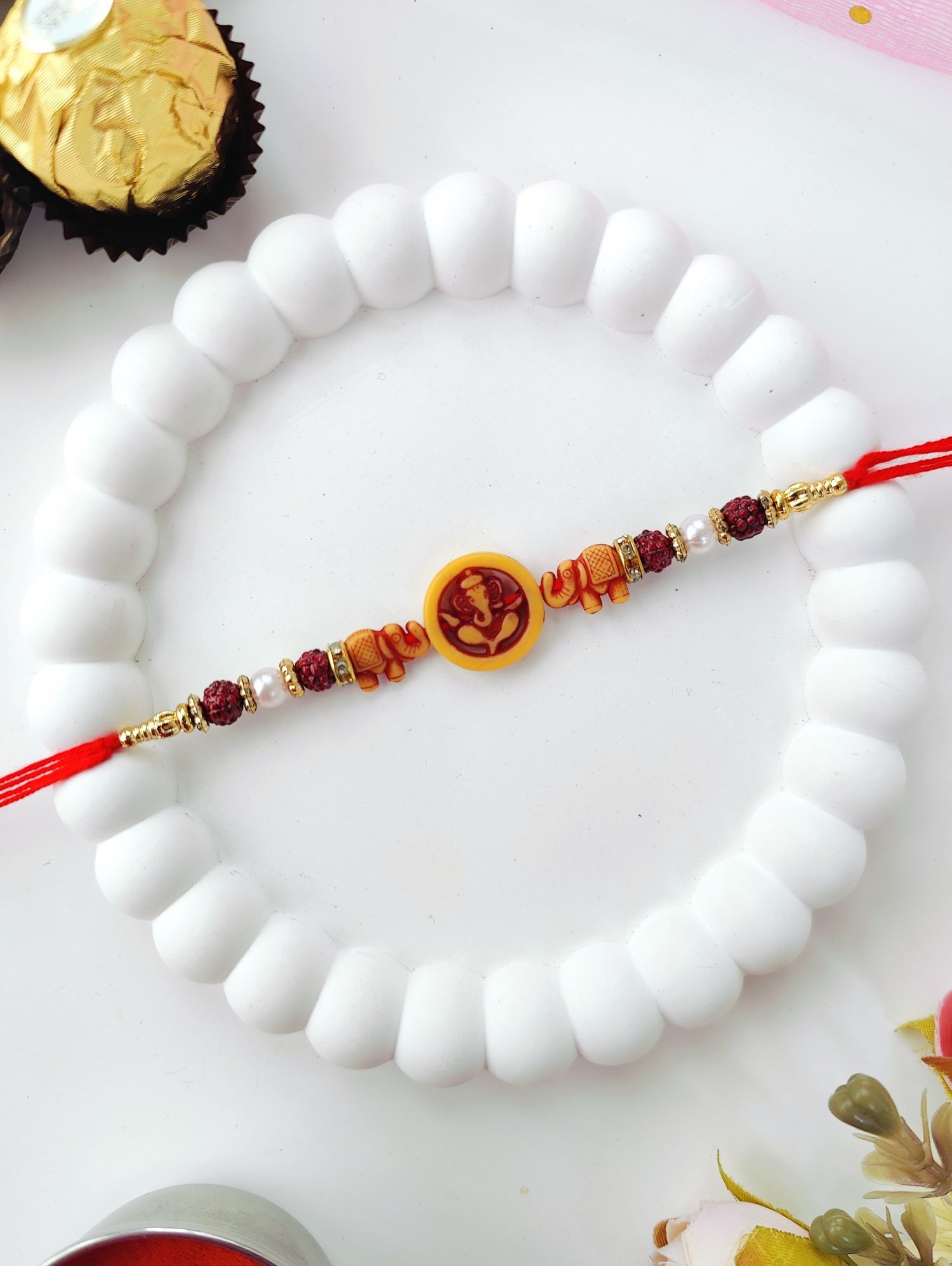 green handmade Ganesh rakhi set of 4, best beads rakhi for brother