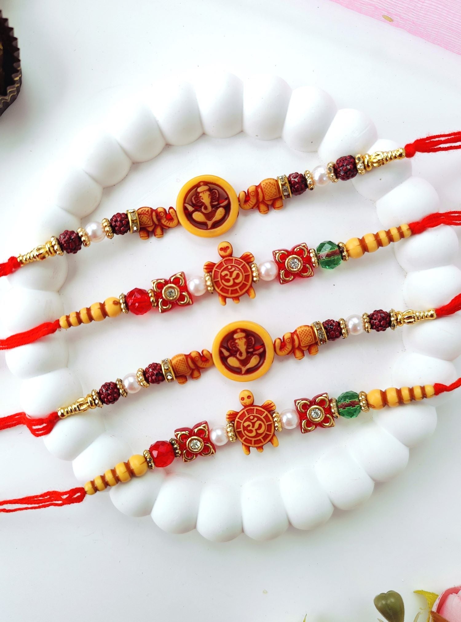 green handmade Ganesh rakhi set of 4, best beads rakhi for brother