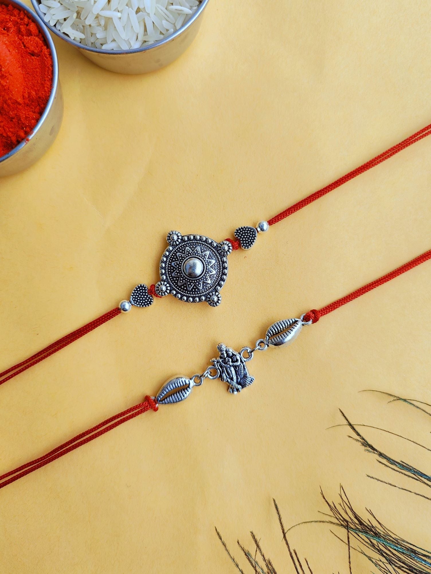 Oxidised Silver Krishna Feather Rakhi Set for Brother & Bhabhi 2026