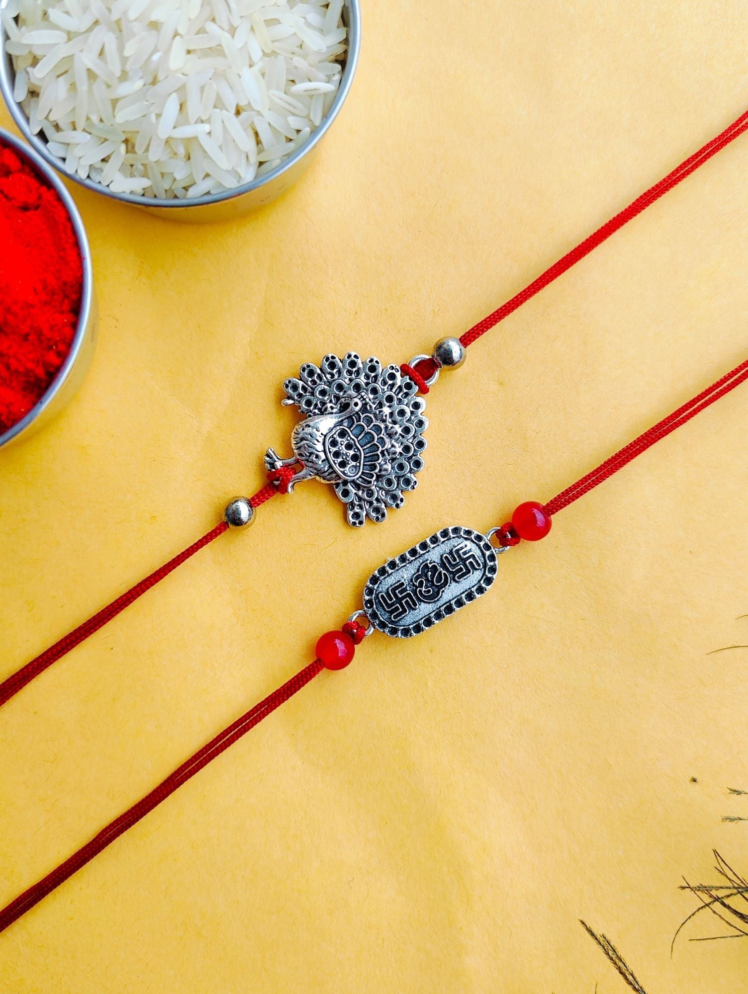 Oxidised Silver Peacock Om Rakhi 2026 for Brother & Bhabhi Set