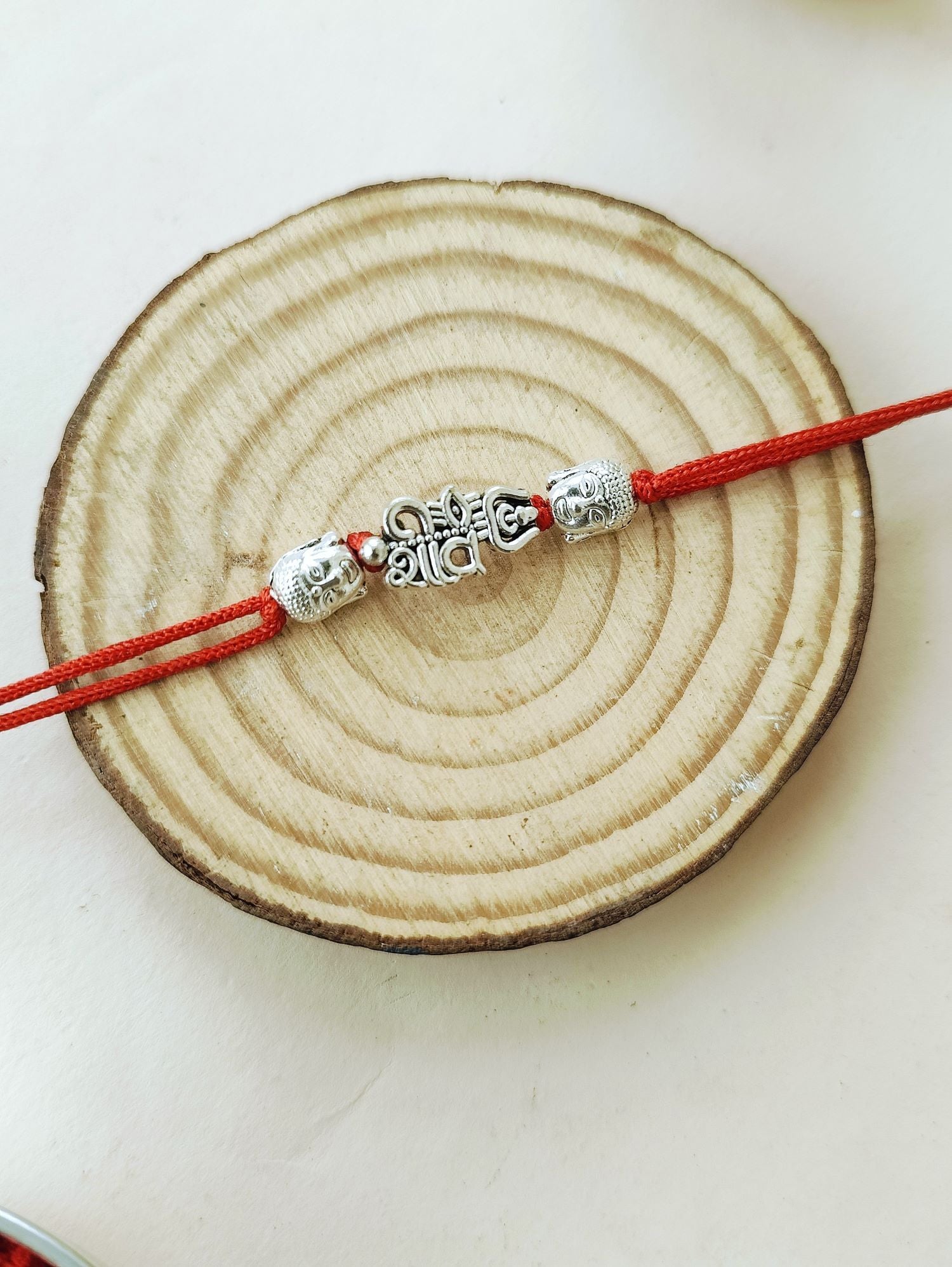 Silver oxidised Shiva rakhi, handmade designer rakhi for brother