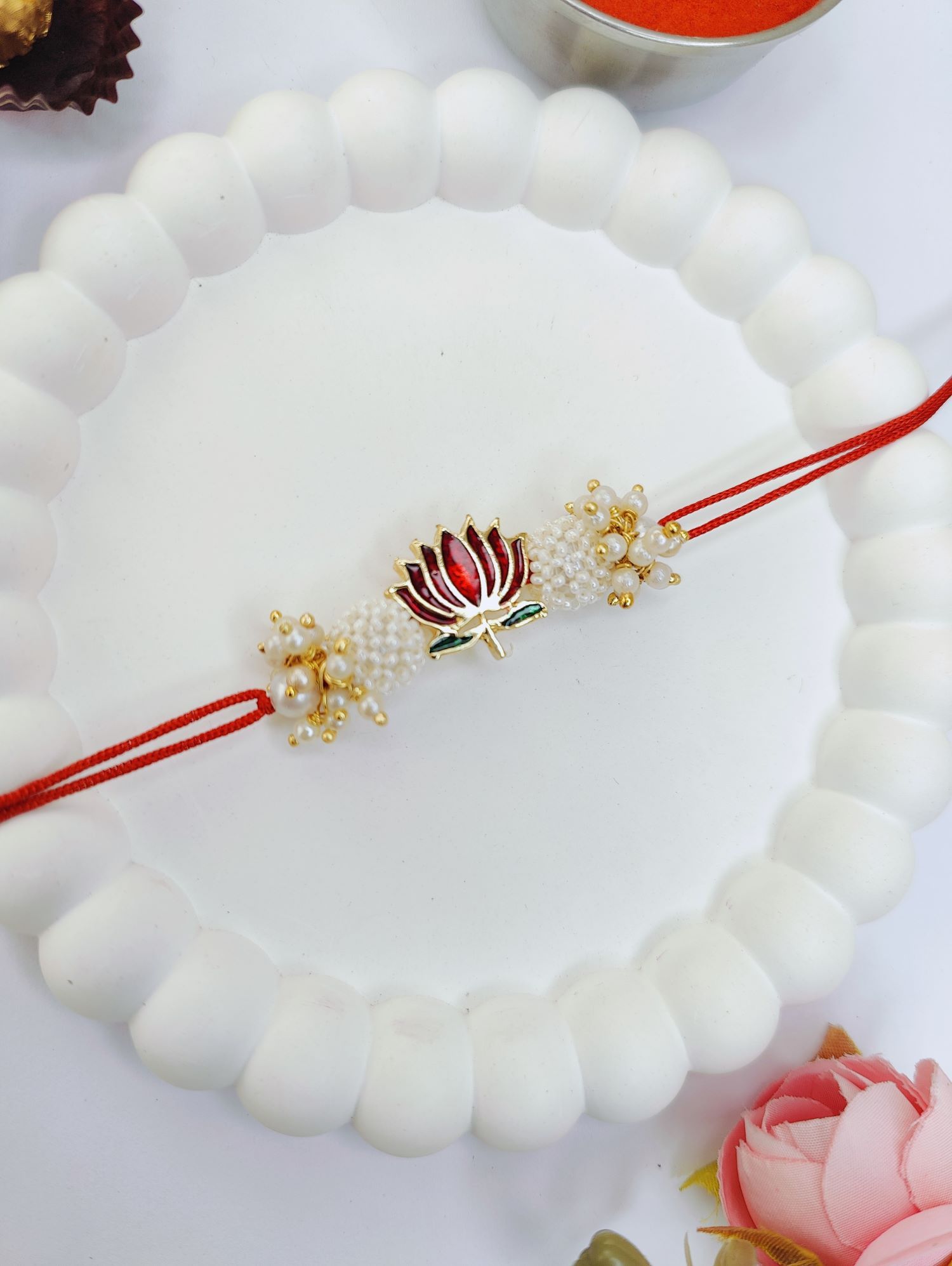 handmade lotus couple rakhi for bhaiya bhabhi with pearl bead design