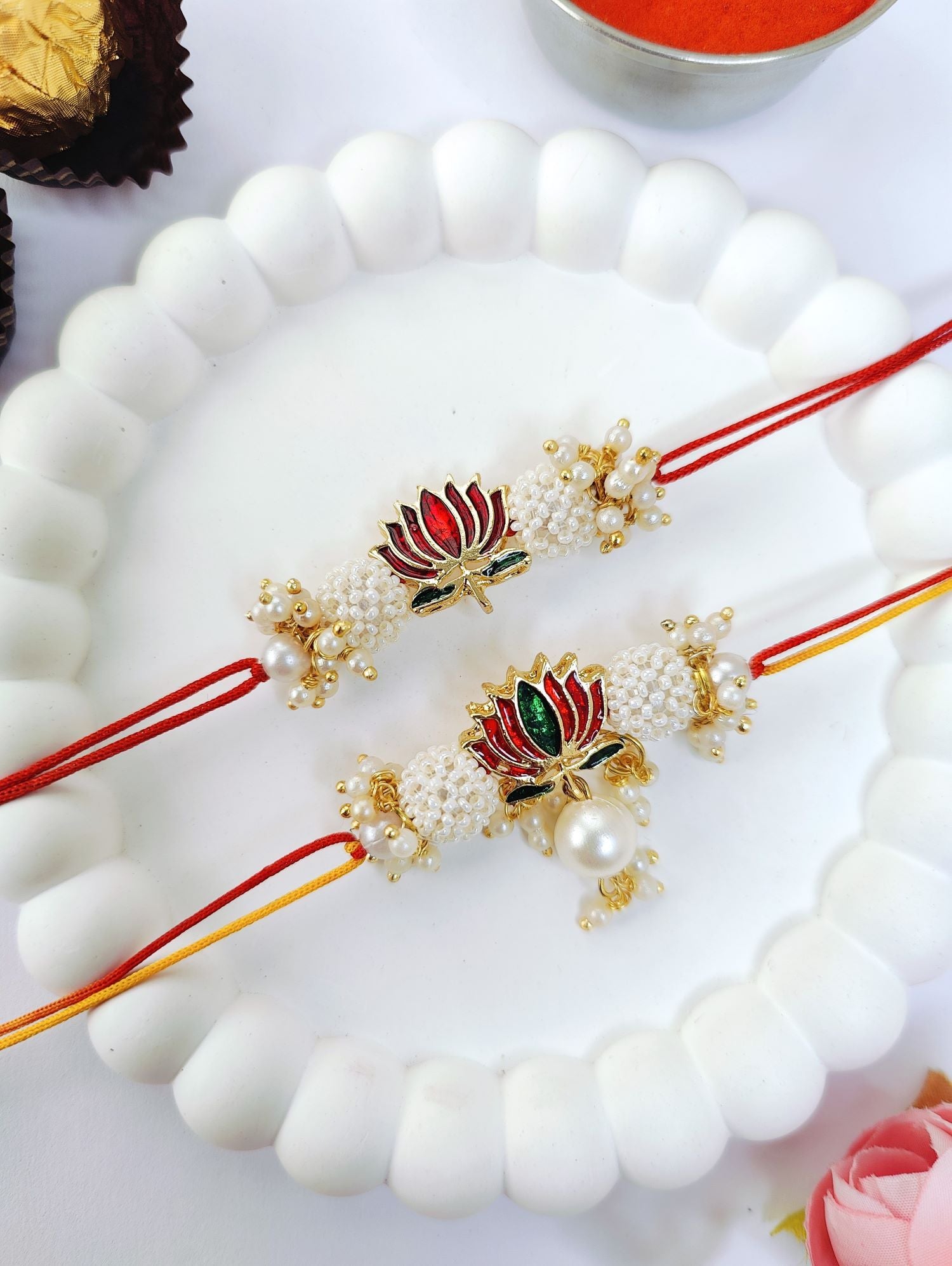 handmade lotus couple rakhi for bhaiya bhabhi with pearl bead design