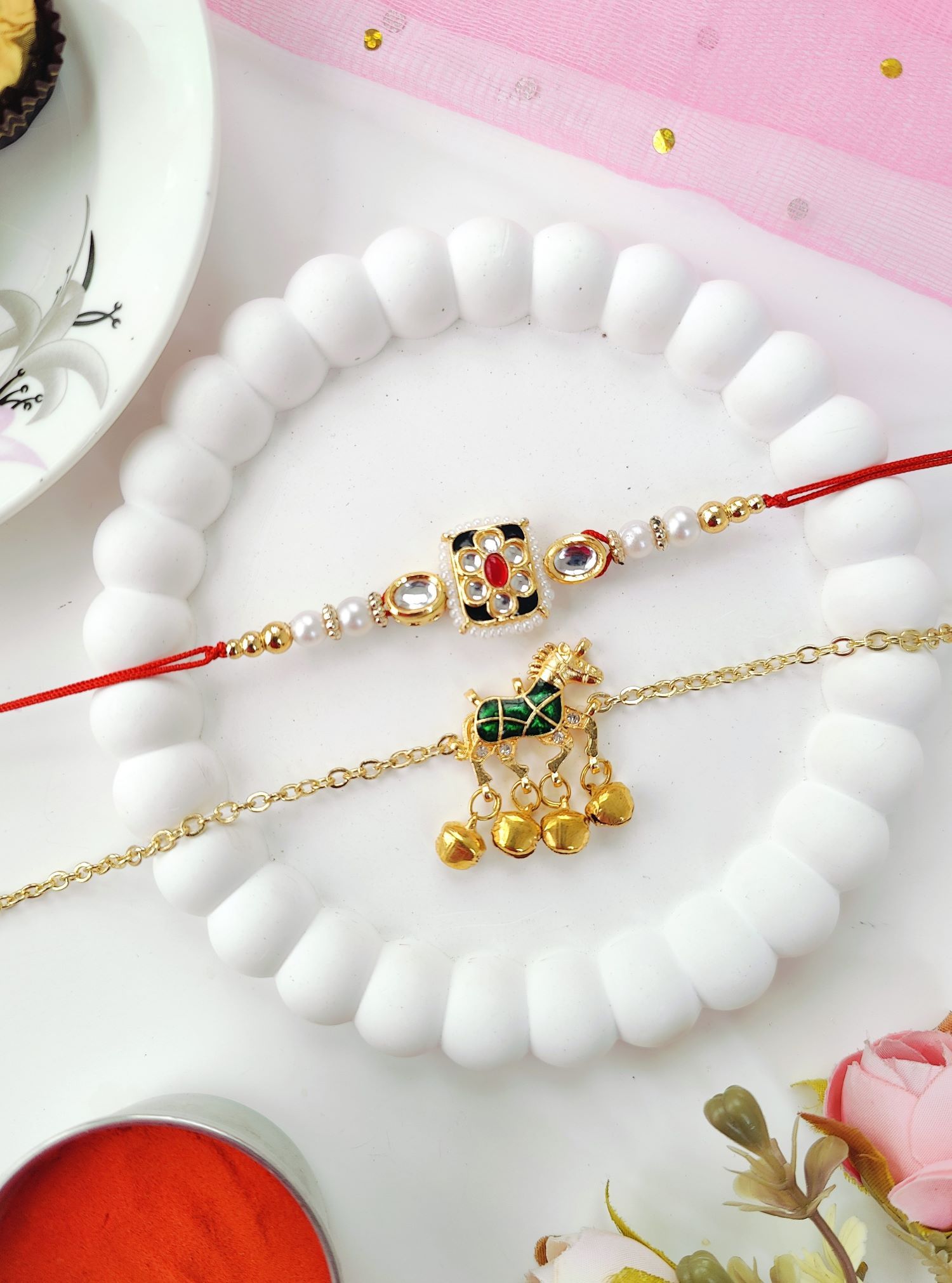 green couple rakhi set with horse, kundan and handmade Kashmiri rakhi