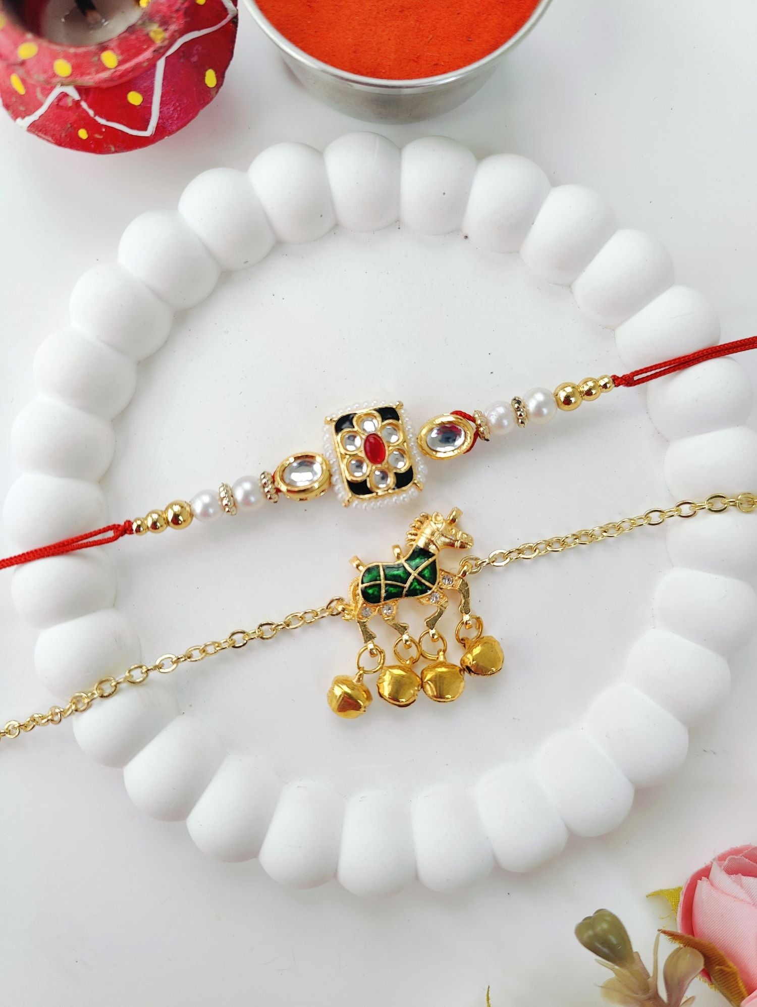 green couple rakhi set with horse, kundan and handmade Kashmiri rakhi