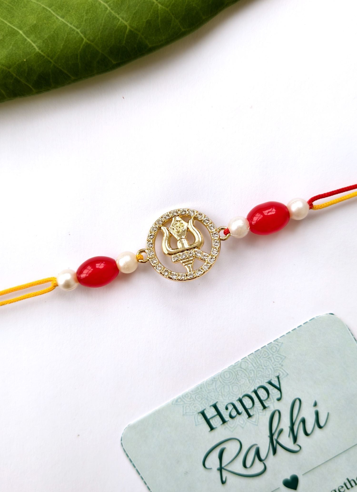 handmade Trishul rakhi for bhaiya bhabhi, premium pearl bead couple set 2026