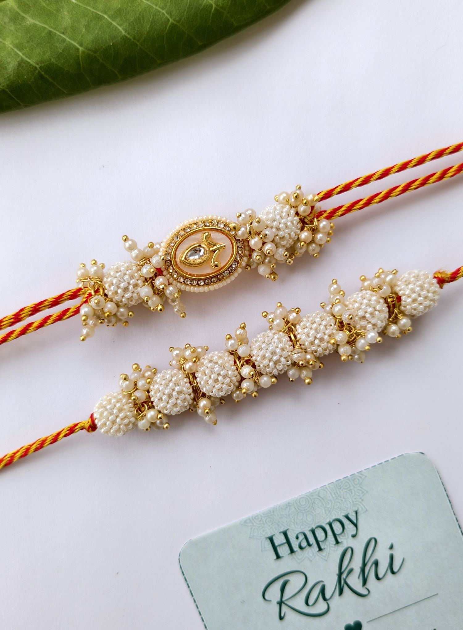 white pearl bead handmade rakhi for bhaiya bhabhi with kundan