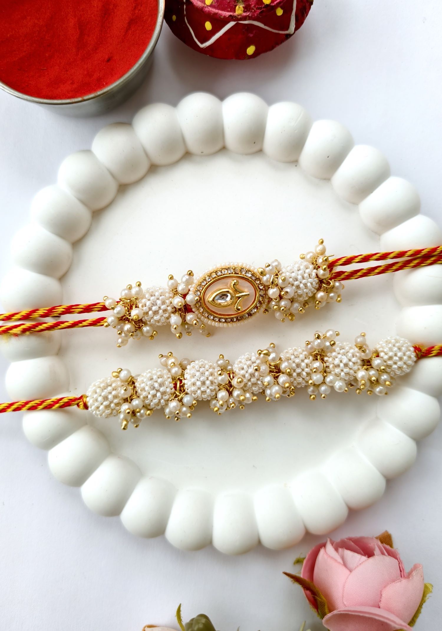 white pearl bead handmade rakhi for bhaiya bhabhi with kundan