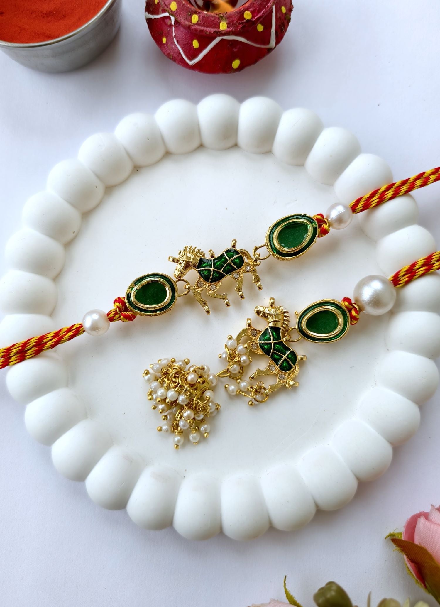 green kundan lumba rakhi for bhabhi with pearl tassel, couple rakhi 2026