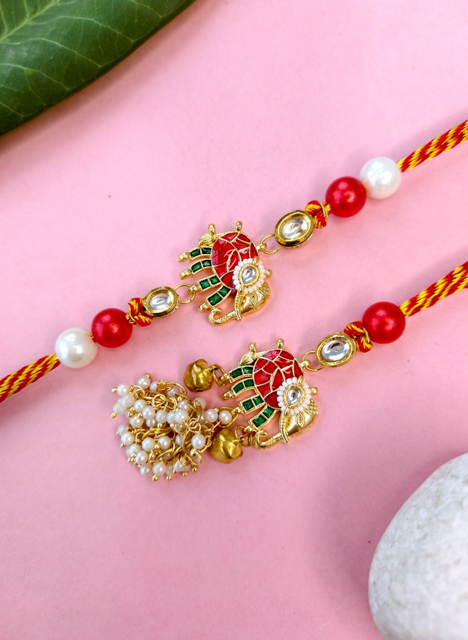 handmade elephant design bracelet rakhi, red green kundan couple set