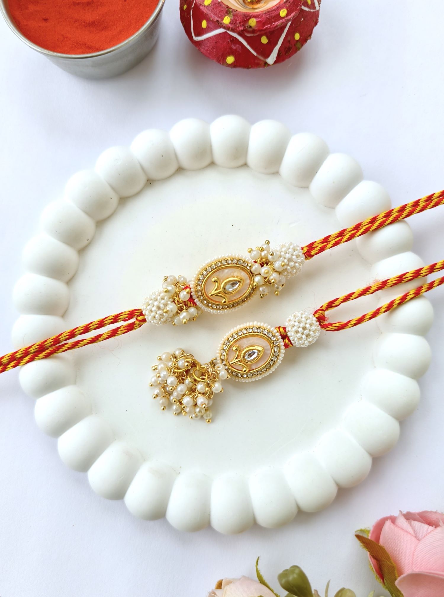 pearl kundan couple rakhi set for bhaiya bhabhi, designer rakhi 2026