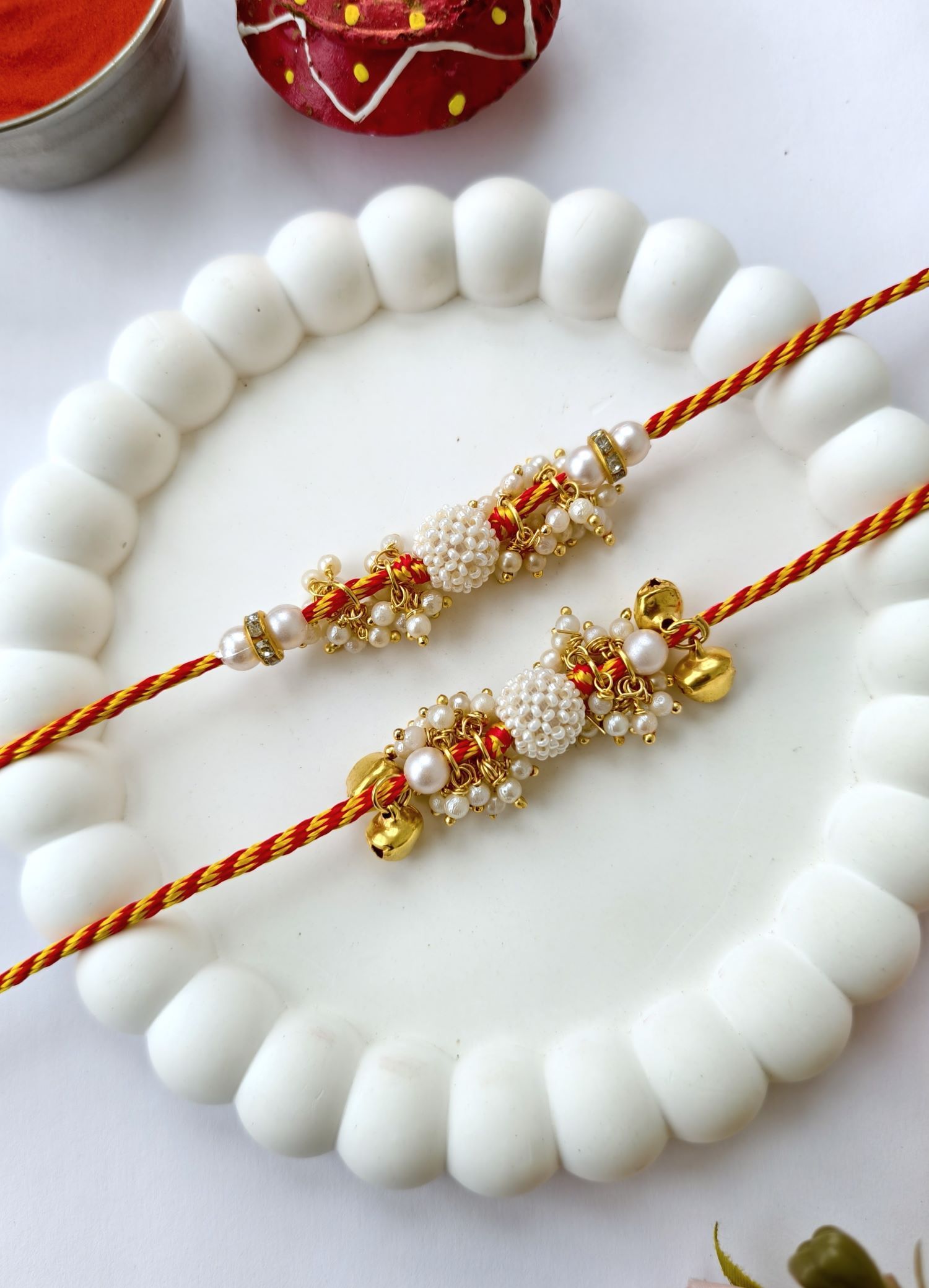 white handmade rakhi set, kundan pearl couple rakhi for bhaiya bhabhi