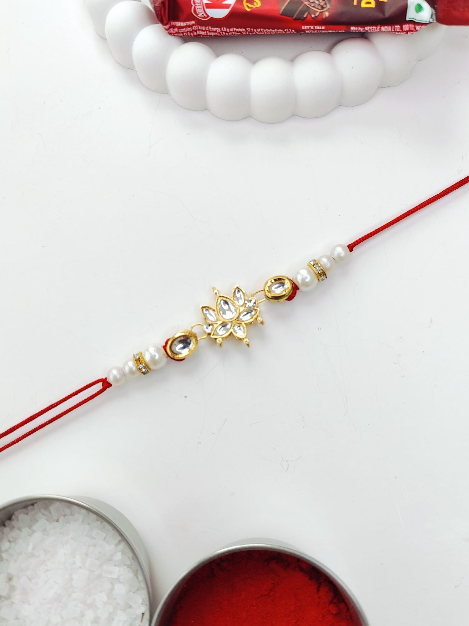 kashmiri pearl watch with yellow kundan couple rakhi for bhaiya bhabhi