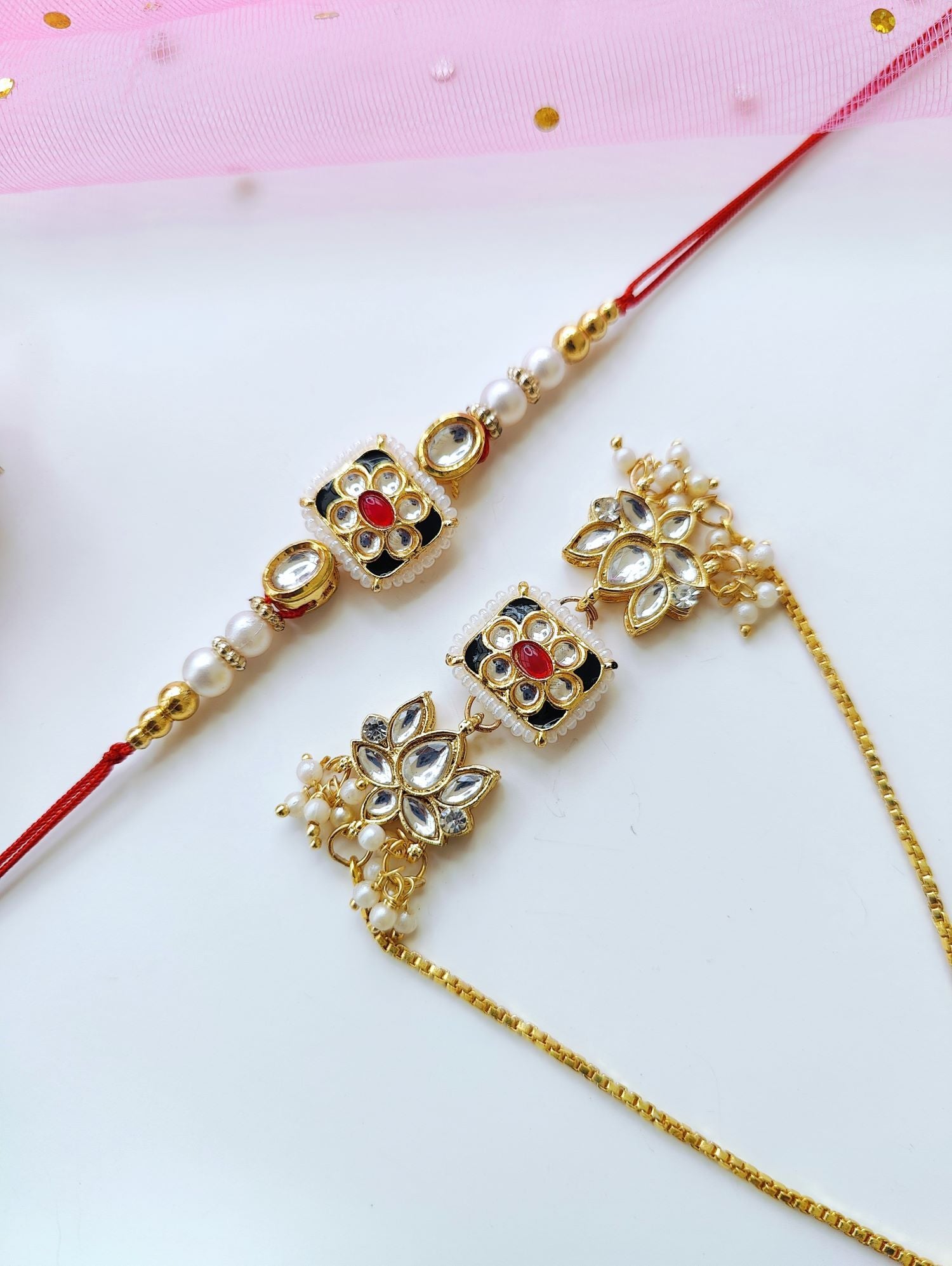 Designer Bhaiya Bhabhi Rakhi set with lotus Kundan work, traditional pearl beads, perfect for Raksha Bandhan 2026