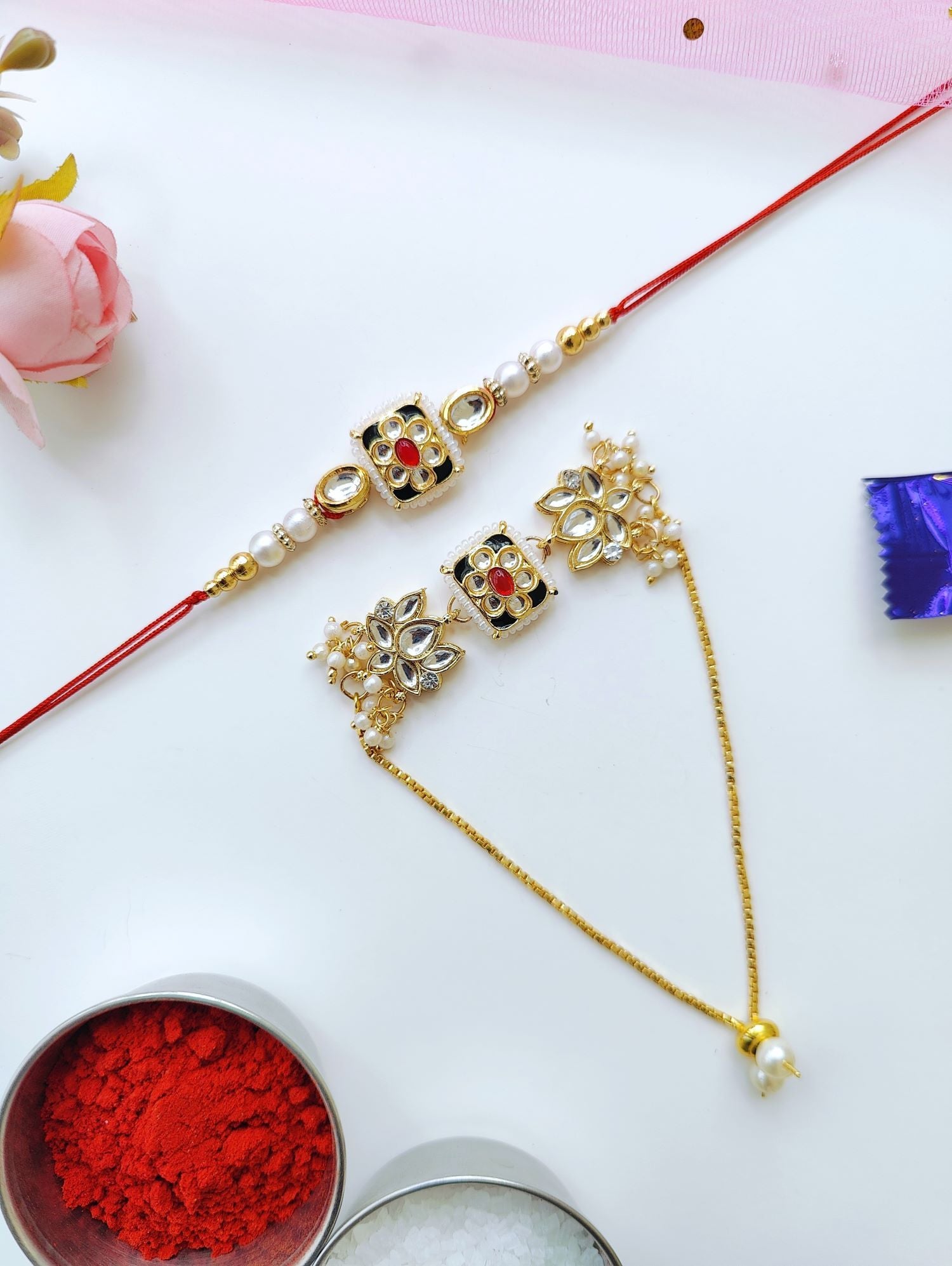 Designer Bhaiya Bhabhi Rakhi set with lotus Kundan work, traditional pearl beads, perfect for Raksha Bandhan 2026