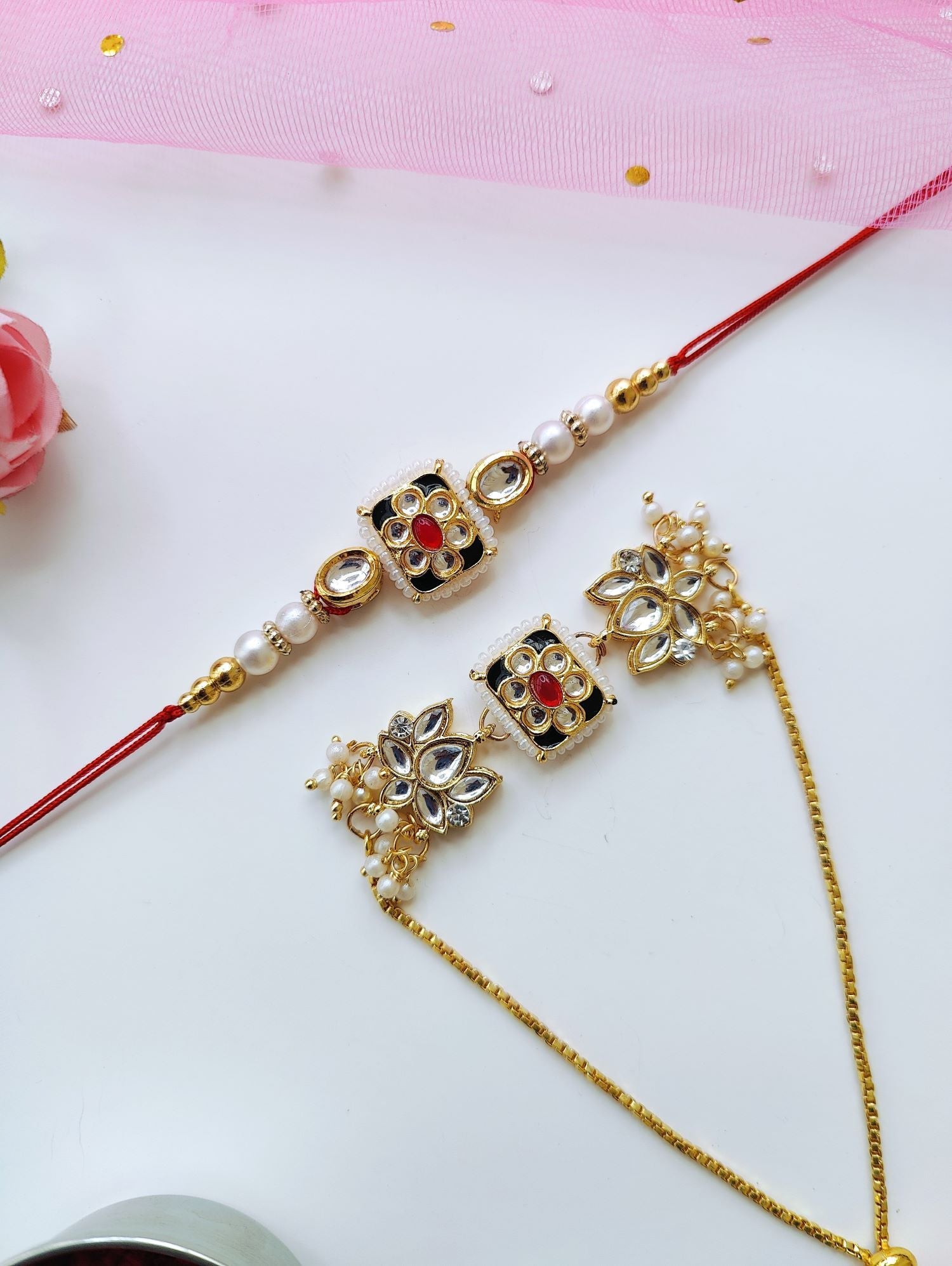 Designer Bhaiya Bhabhi Rakhi set with lotus Kundan work, traditional pearl beads, perfect for Raksha Bandhan 2026