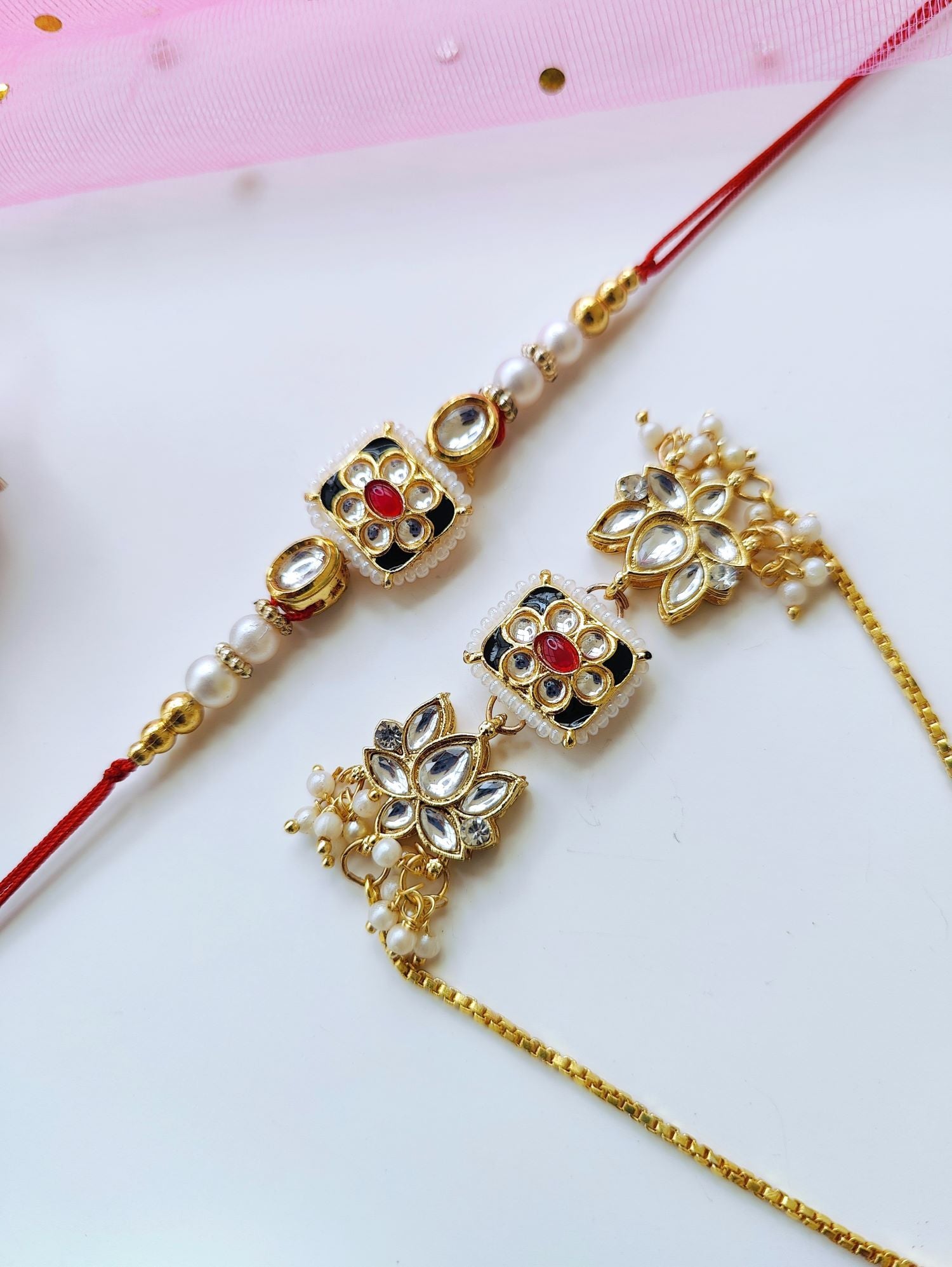 Designer Bhaiya Bhabhi Rakhi set with lotus Kundan work, traditional pearl beads, perfect for Raksha Bandhan 2026