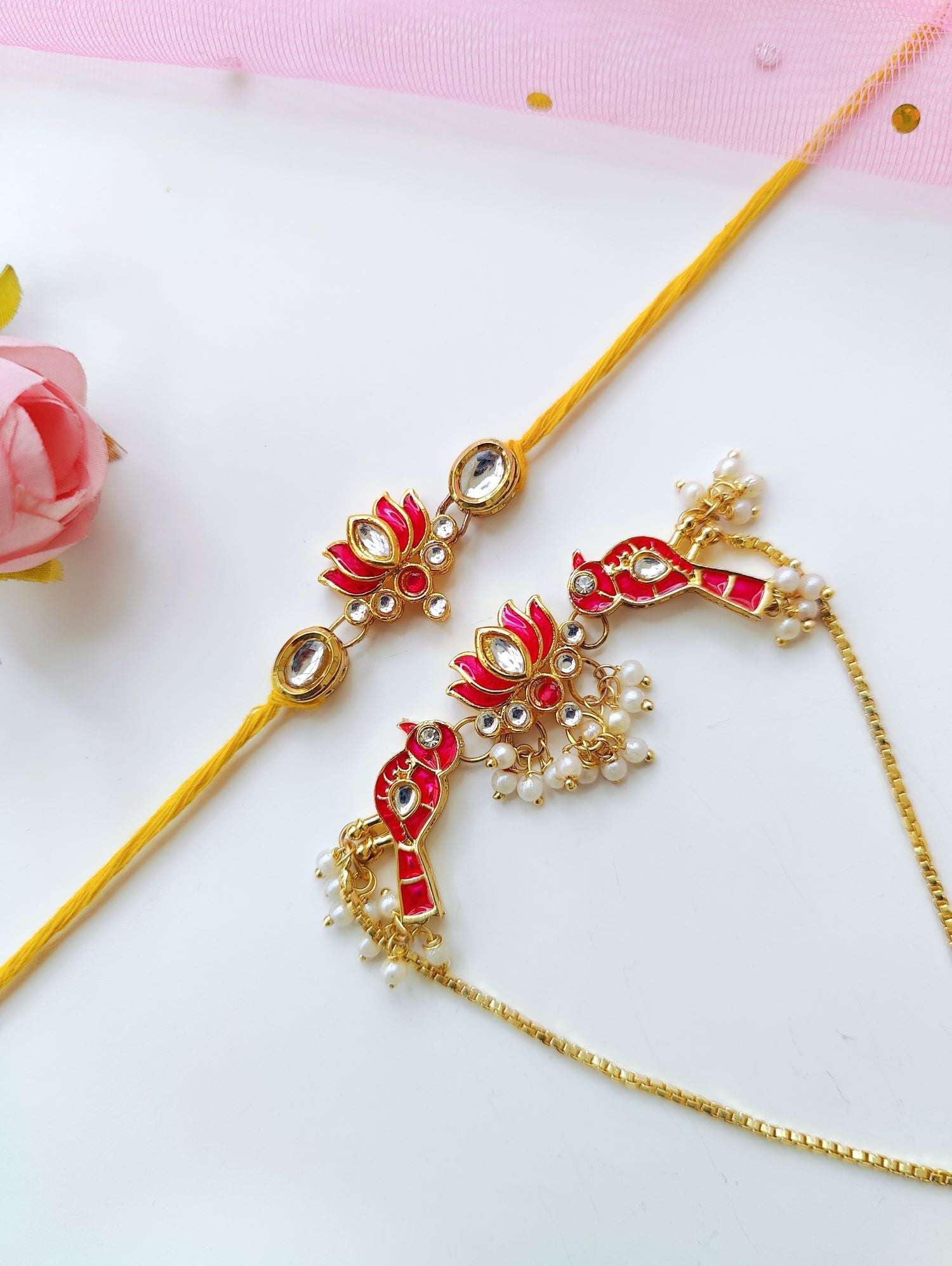Handmade Bhaiya Bhabhi Rakhi set with lotus design, Kundan stones, pearl beads; traditional rakhi for brother 2026